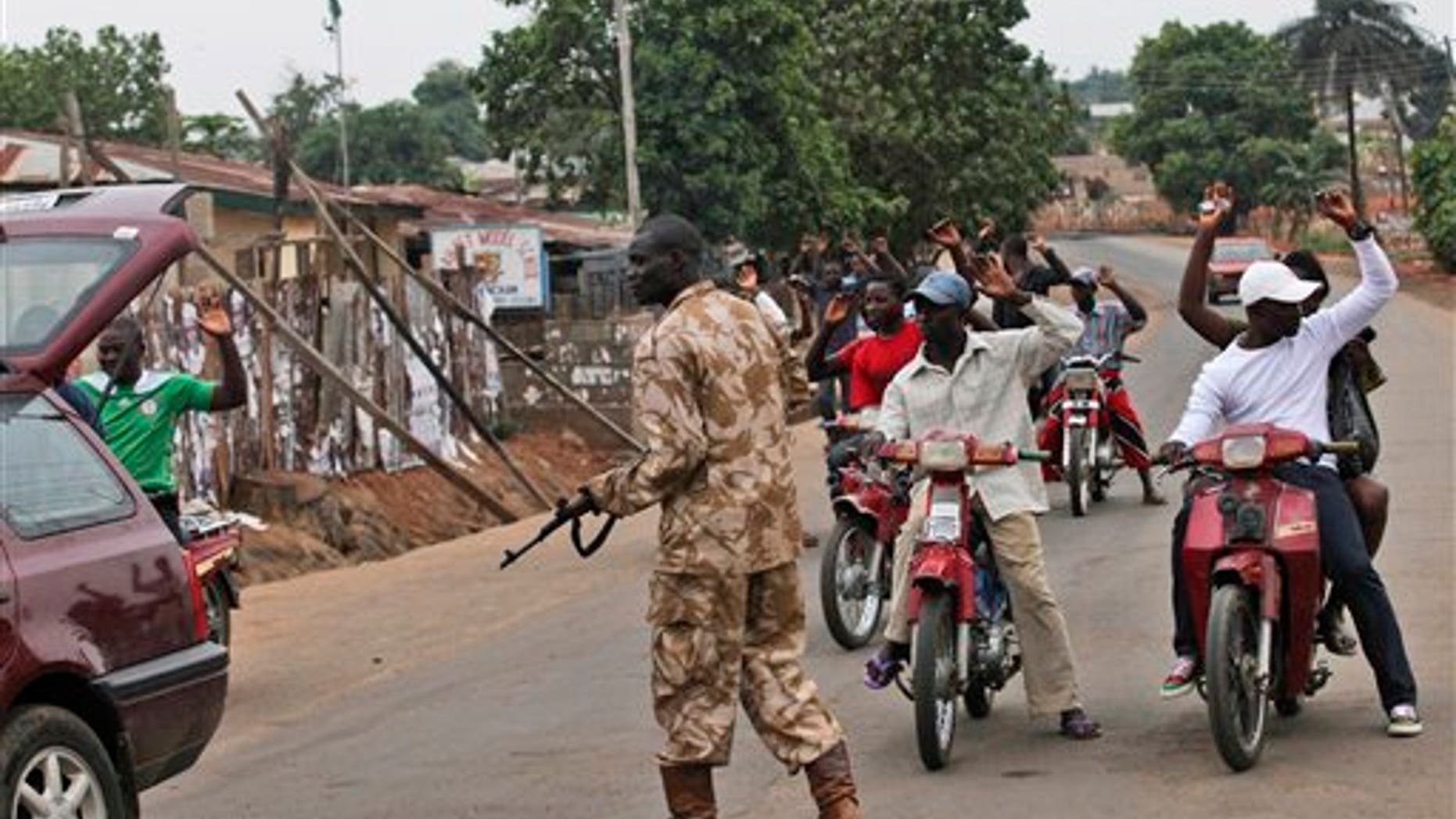 April 21: A soldier searches a car in Kaduna, Nigeria. An Associated Press tour of rural eastern Kaduna state Thursday with military leaders showed violence far beyond what federal authorities seem willing to acknowledge, with towns destroyed and the smell of decomposing bodies in the air. (AP)