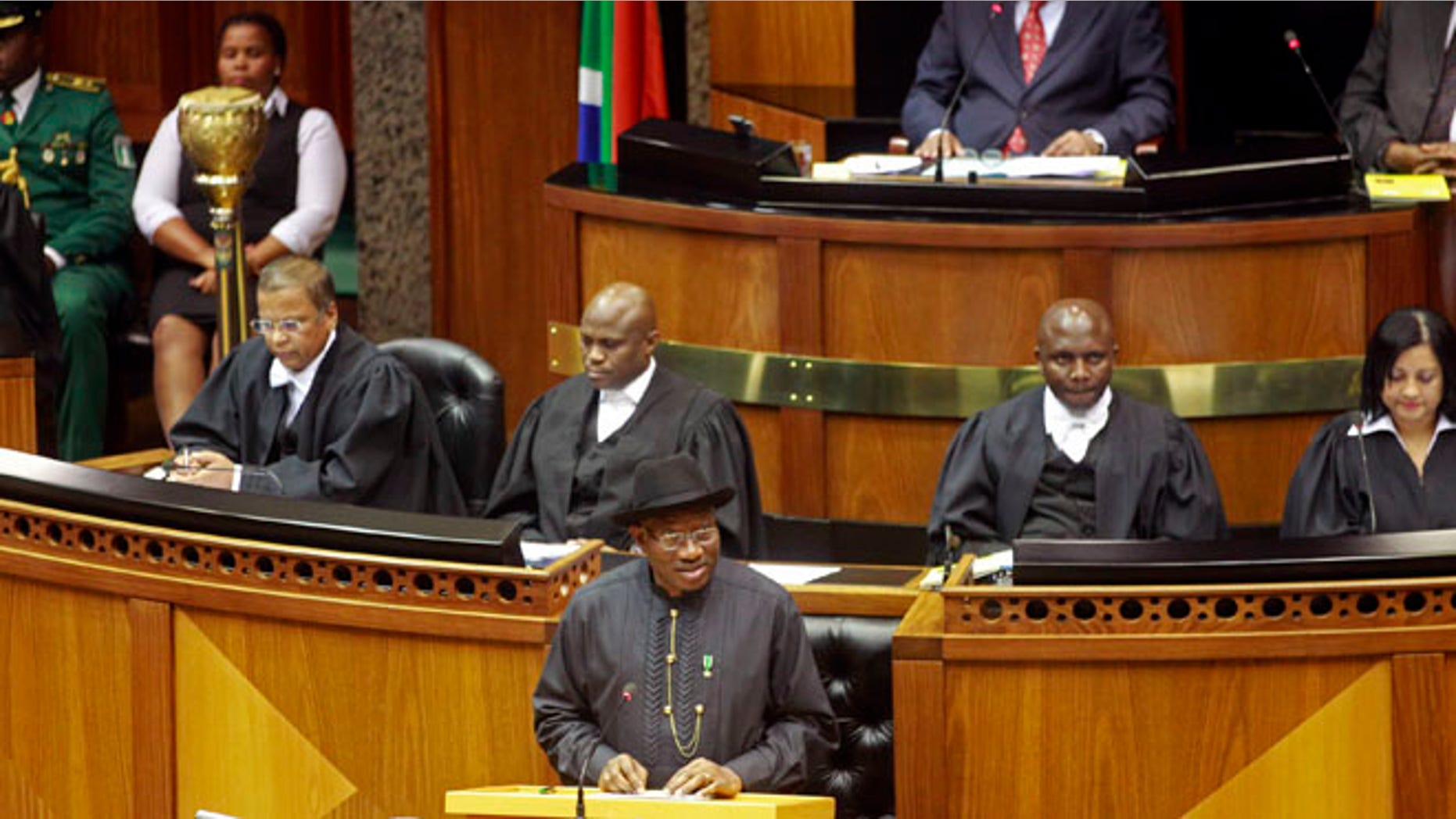 May 7, 2013: Nigerian President Goodluck Jonathan, center, makes a speech in the South African Parliament in Cape Town.