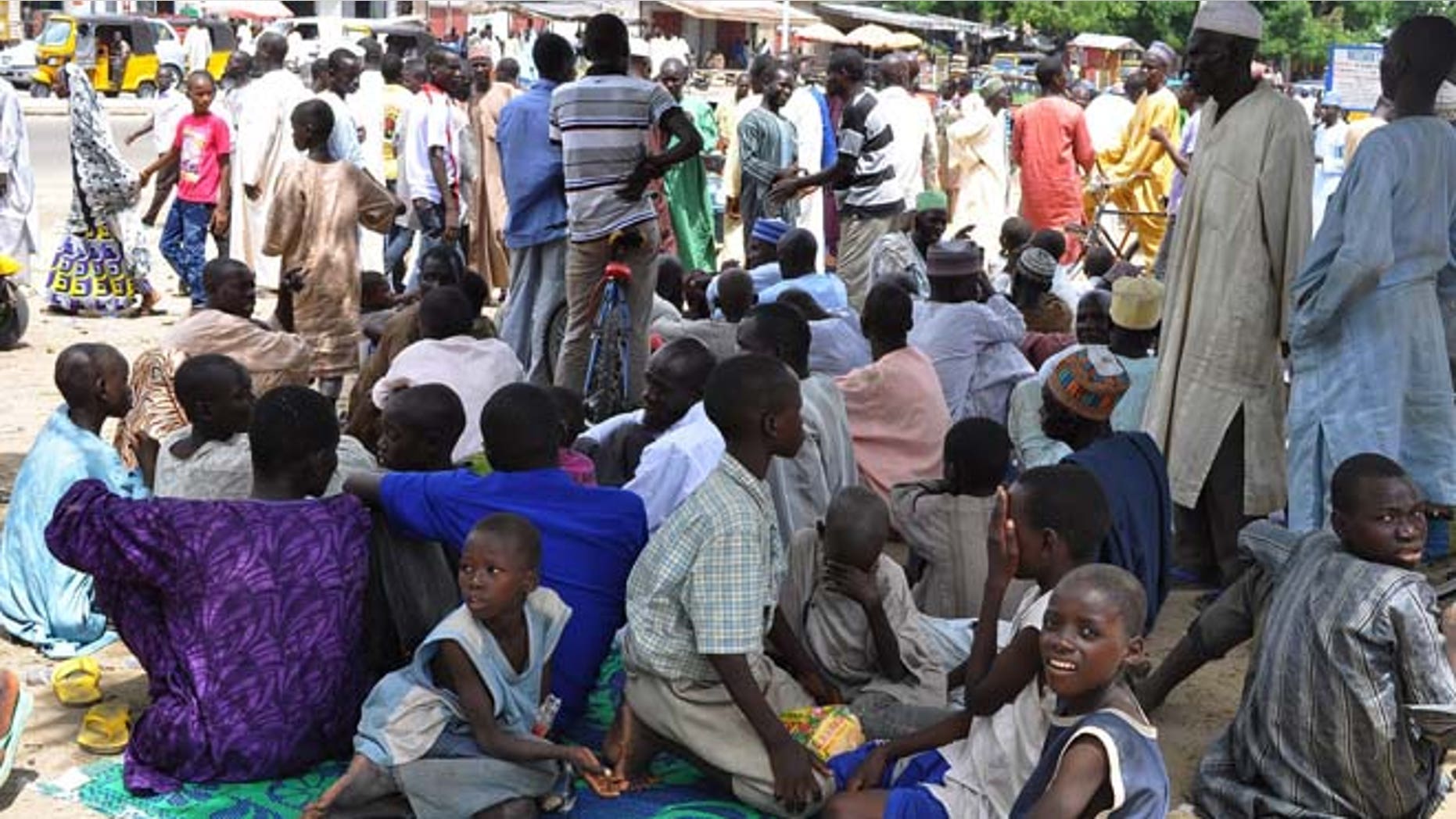 Sept. 3, 2014: Civilians who fled their homes following an attacked by Islamist militants in Bama, take refuge at a School in Maiduguri, Nigeria. (AP)