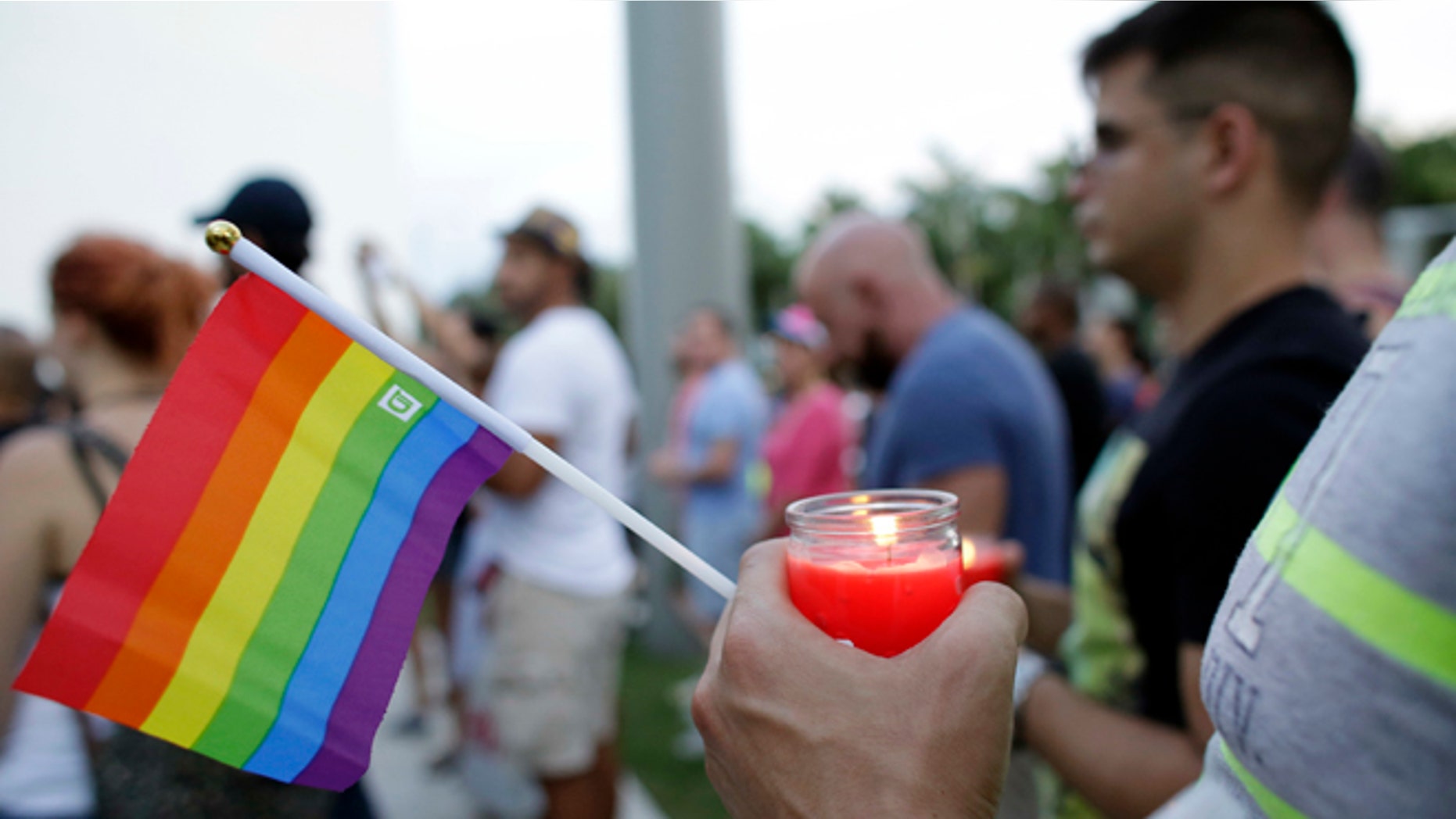 A vigil in memory of the victims of the Orlando mass shooting, Sunday, June 12, 2016, in Miami Beach, Fla.