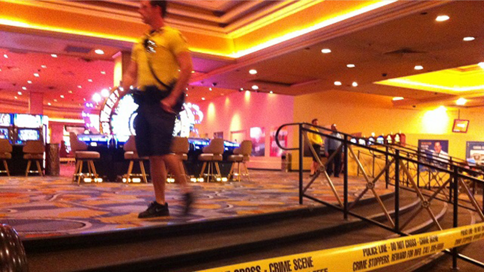 Oct. 21, 2013: Security personnel cordon off the scene of an early morning shooting at Bally's Hotel-Casino on the Las Vegas Strip.