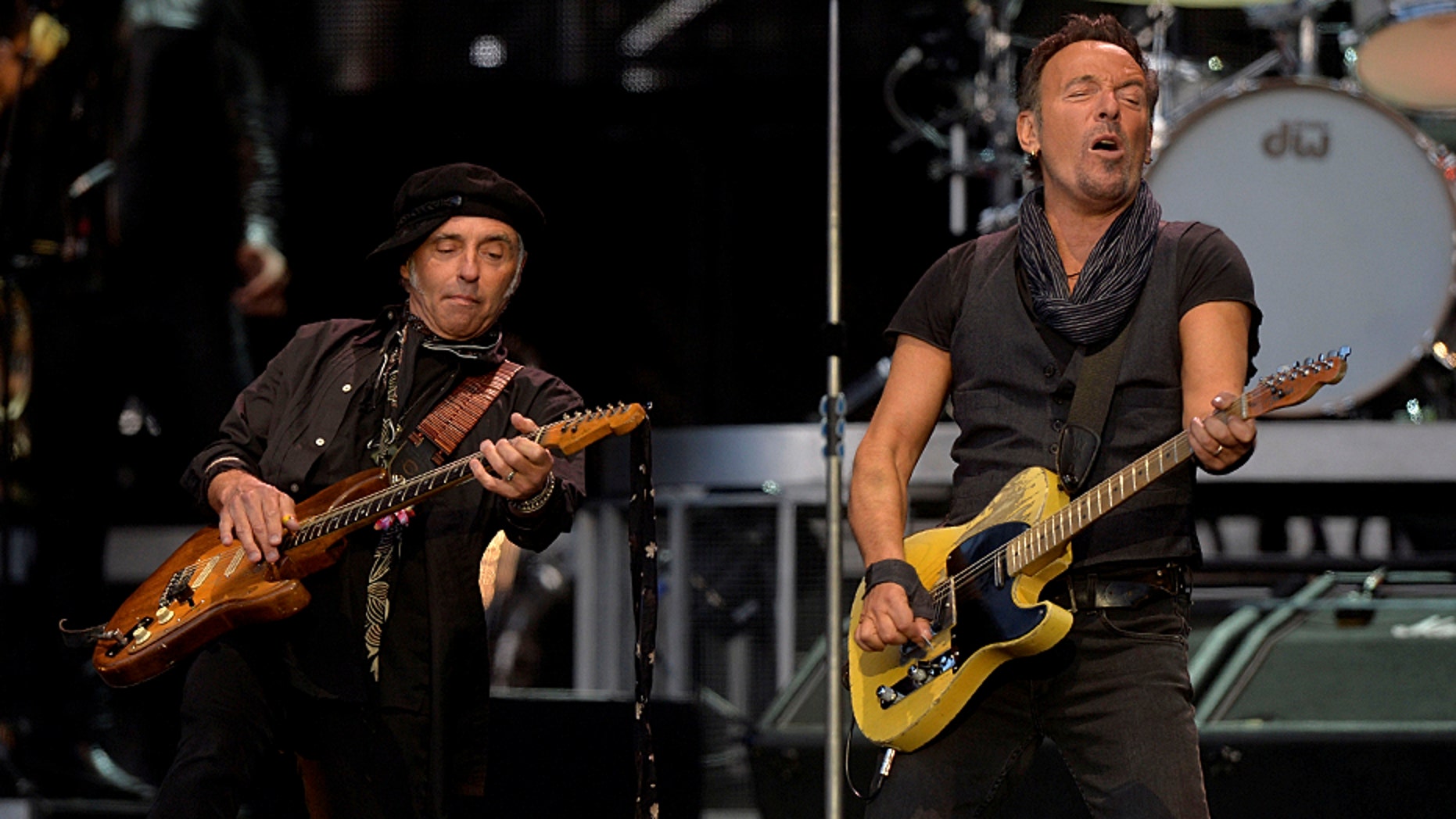 Nils Lofgren, left, guitarist of Bruce Springsteen's E Street Band, had four guitars and other equipment stolen before his Dallas show.