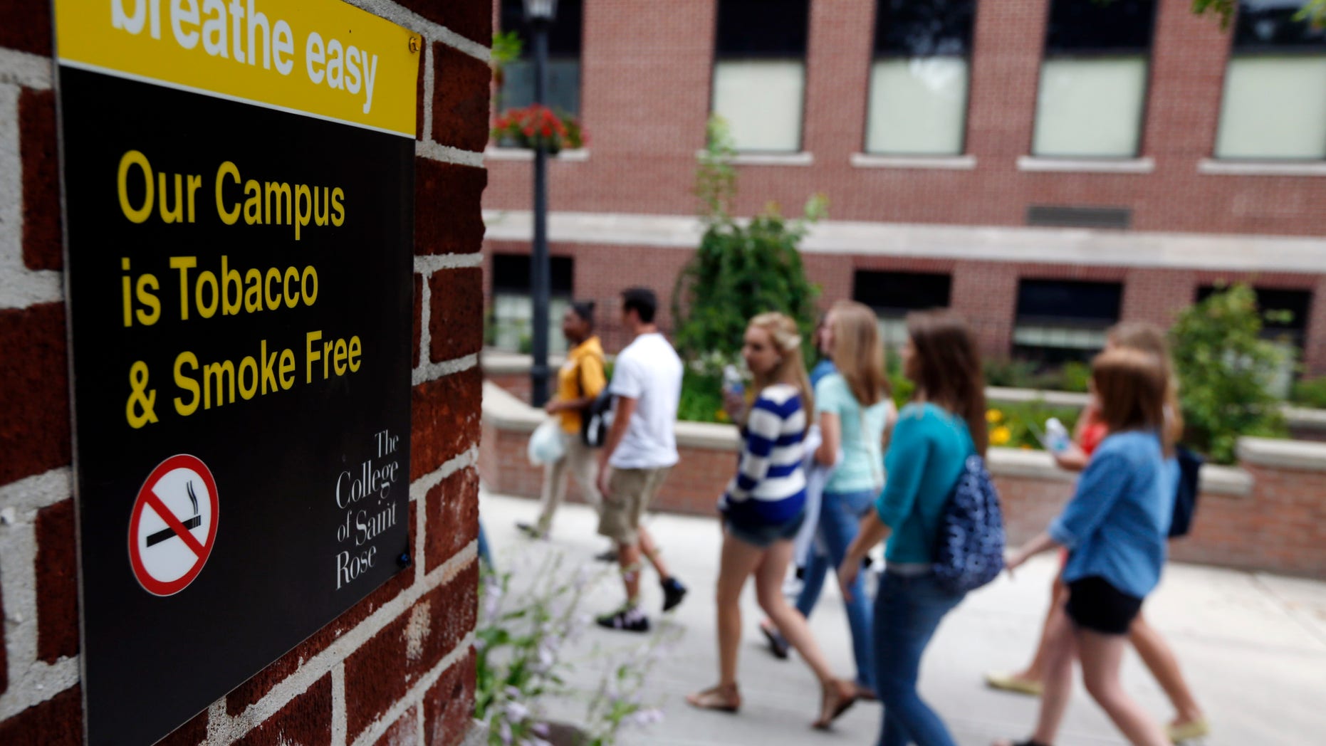 June 26, 2012: Students take an orientation tour at the College of Saint Rose in Albany, N.Y. Tobacco use bans are sweeping campuses nationwide.