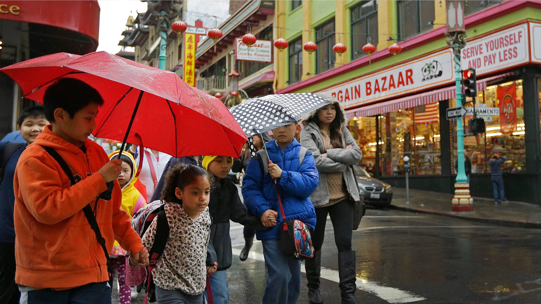 Feb. 6, 2015: Children from San Francisco Community School walk through Chinatown while on a field trip.