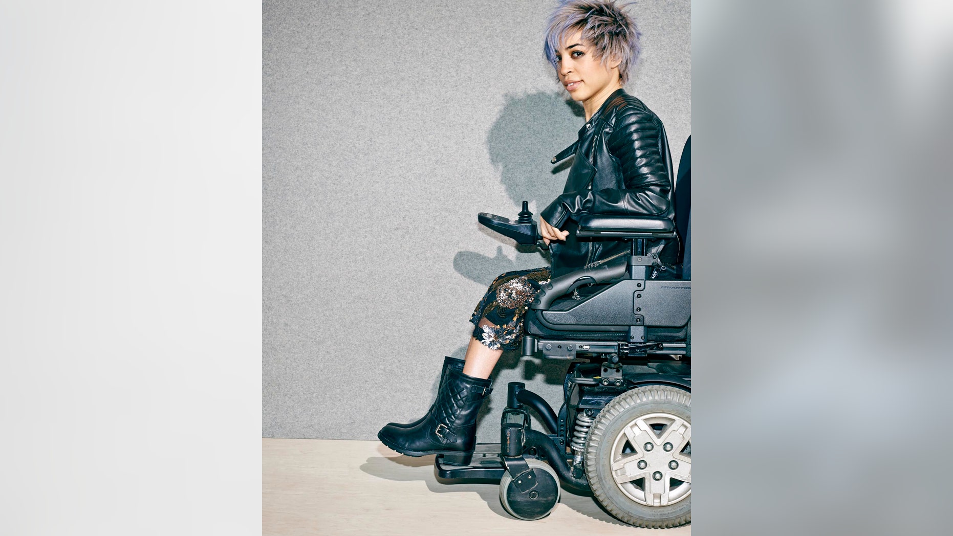 This undated image provided by Nordstrom shows a model in a wheelchair advertising boots in the companys annual July anniversary catalog, which is its biggest sale event of the year with preview discounts on new fashions for fall. Nordstrom has been using professional models with disabilities in ads and catalogs since 1997. A consulting firm called Global Disability Inclusion says only a few companies use models with disabilities _ though there are more now than in the past _ and calls Nordstrom an industry leader in that regard. (AP Photo/Nordstrom)