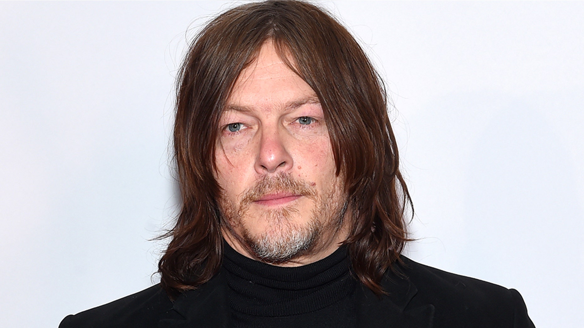 “The Walking Dead” actor Norman Reedus and his former partner, Danish model Helena Christensen, reunited to celebrate their son’s high school graduation this week.