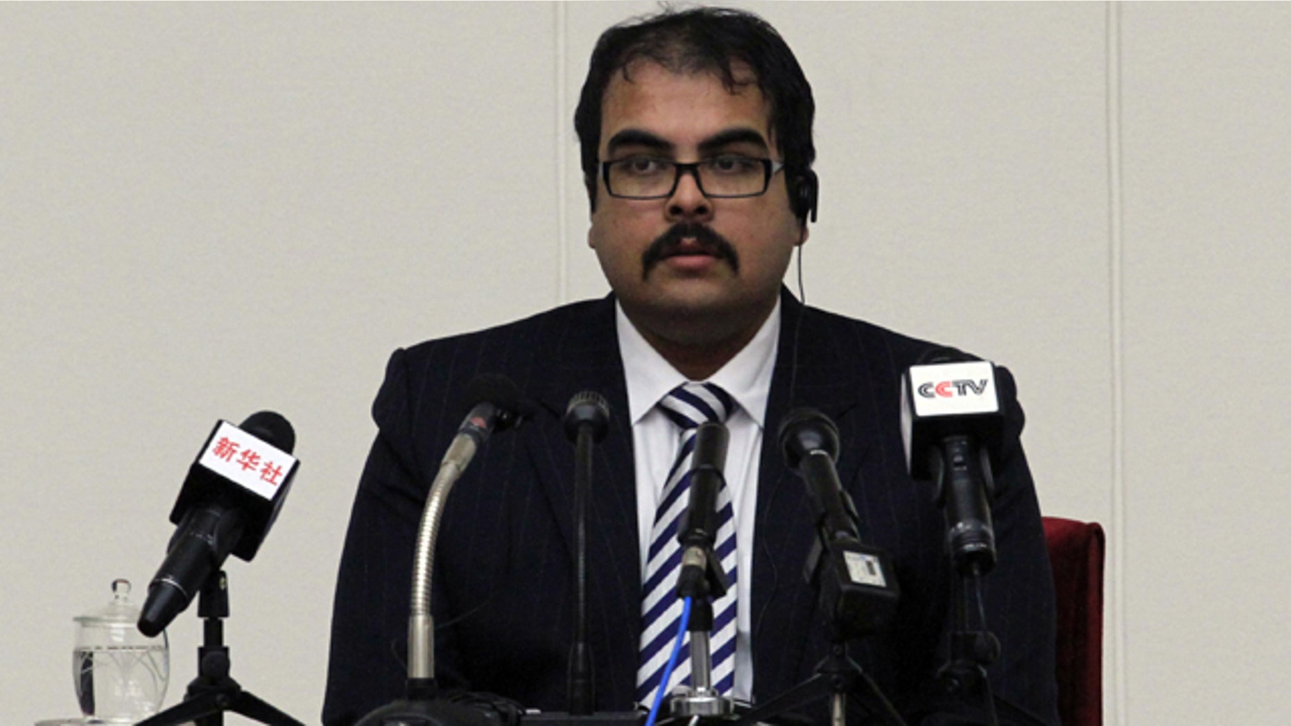 Dec. 14, 2014: Arturo Pierre Martinez, 29, speaks at a press conference at the Peoples Palace of Culture in Pyongyang, North Korea. North Korea on Sunday presented to the media the American, who says he illegally crossed into the country but has not been held in custody and is seeking asylum in Venezuela. (AP Photo/Kim Kwang Hyon)