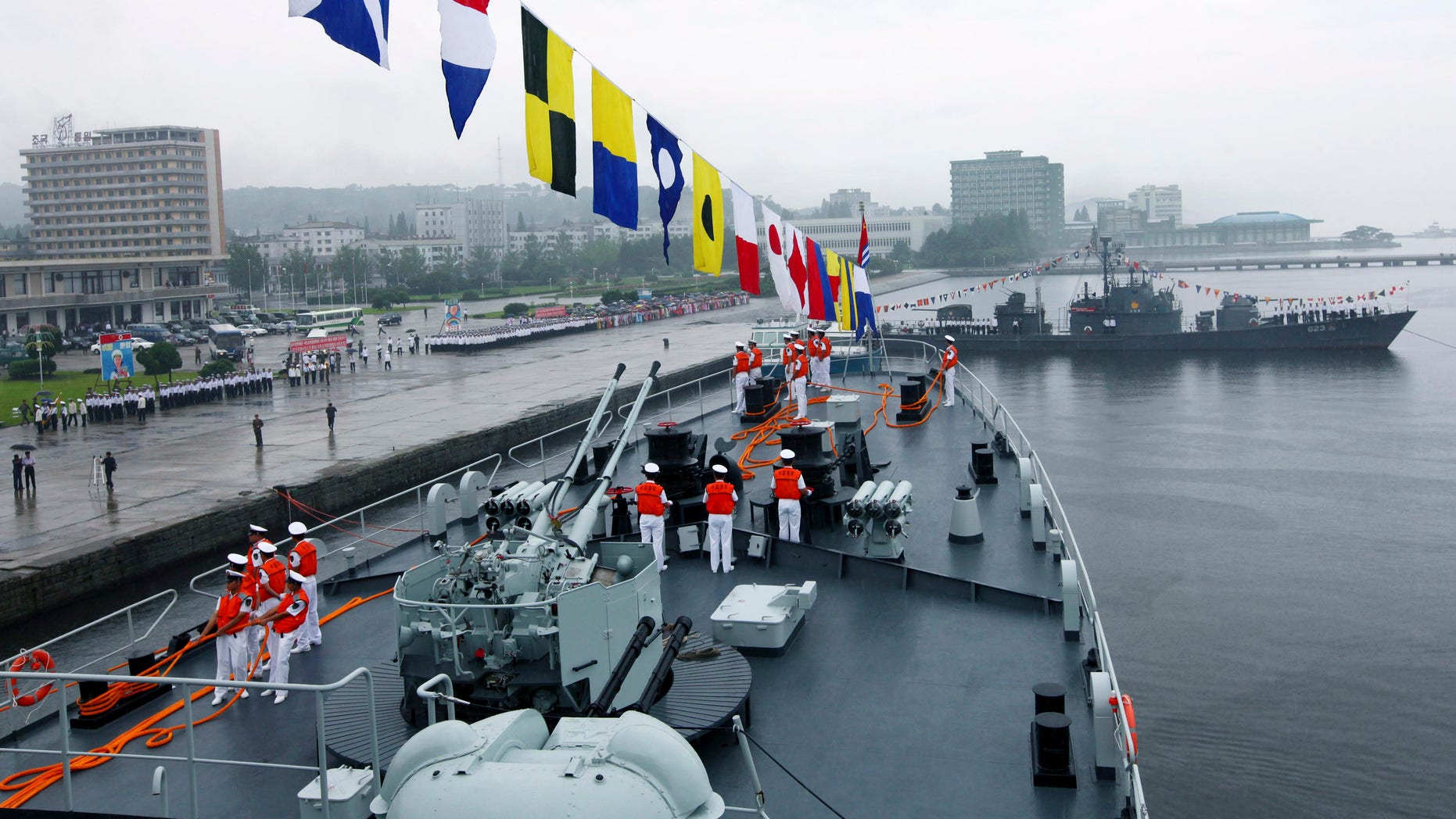 Chinese Navy fleet composed of missile frigate Luoyang, front, and training ship Zheng He arrives in Wanson, North Korea, Thursday, Aug. 4, 2011.