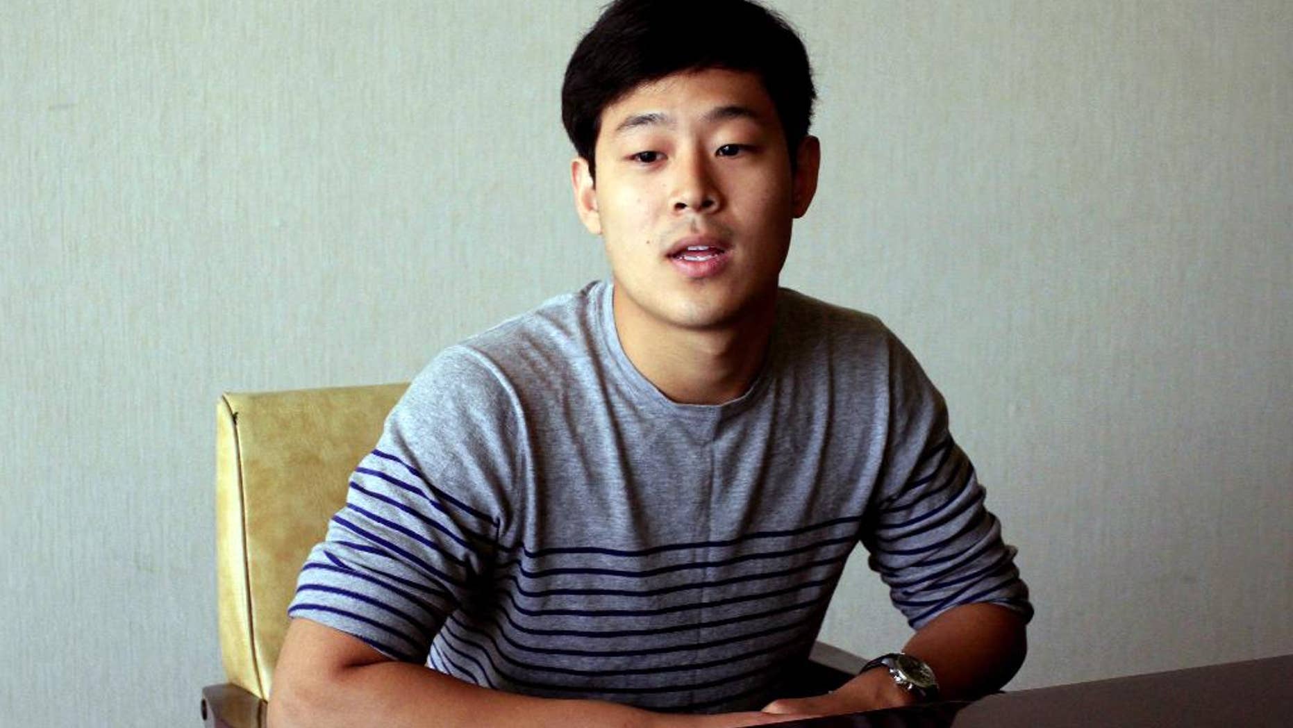 Won Moon Joo, a South Korean student at New York University, is interviewed at the Koryo Hotel in Pyongyang, North Korea Tuesday, July 14, 2015. Joo, who is being detained in North Korea says he hopes to be released soon and has told his family not to worry too much about him. Joo was presented to the media in North Korea’s capital, Pyongyang, on Tuesday. (AP Photo/Kim Kwang Hyon)