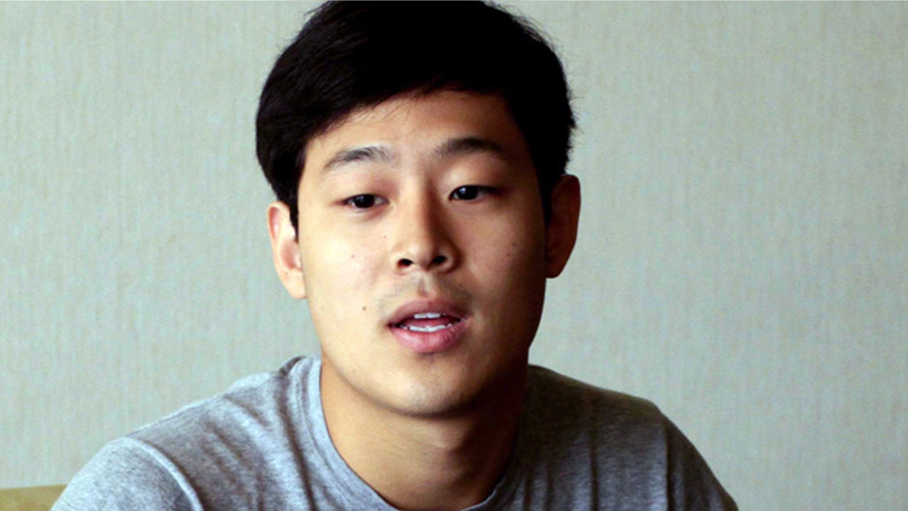 FILE - In this Tuesday, July 14, 2015, file photo, Joo Won-moon, a South Korean student at New York University, is interviewed at the Koryo Hotel in Pyongyang, North Korea. (AP Photo/Kim Kwang Hyon, File)