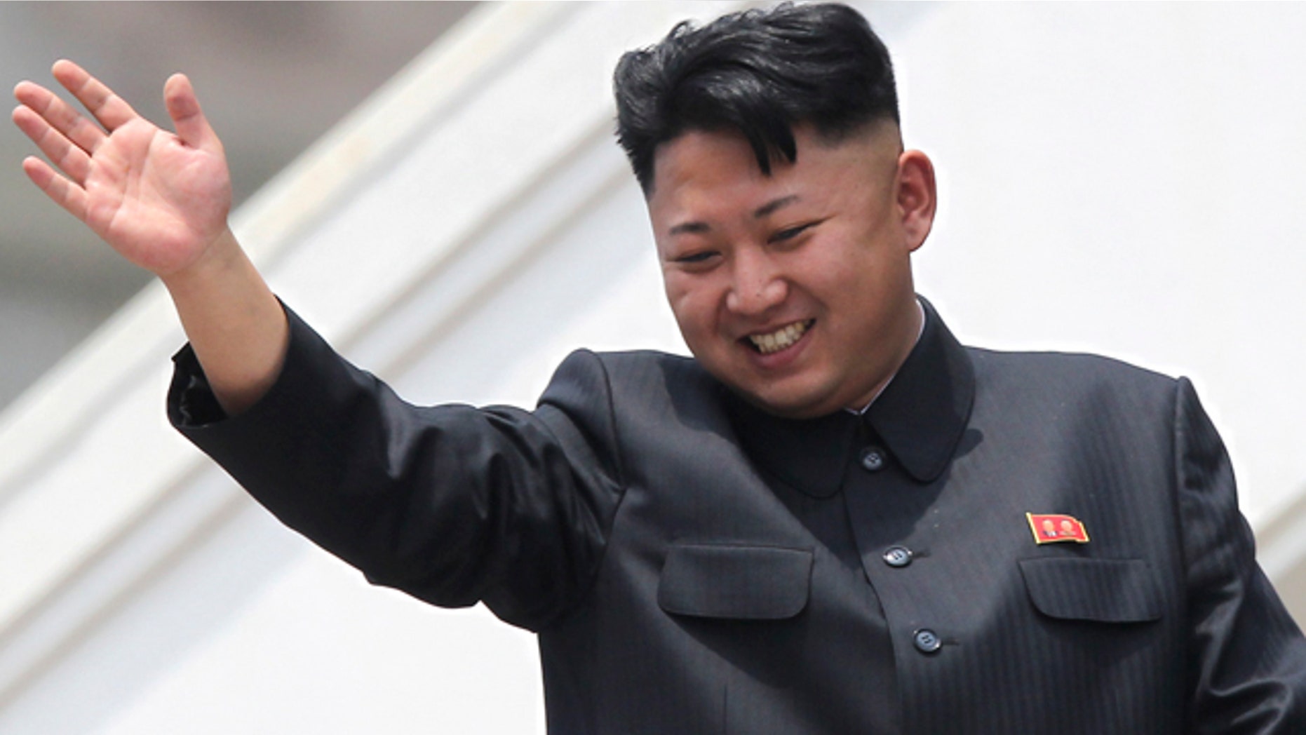 FILE - In this July 27, 2013 file photo, North Korean leader Kim Jong-un waves to war veterans during a mass military parade celebrating the 60th anniversary of the Korean War armistice in Pyongyang. (AP Photo/Wong Maye-E, File)