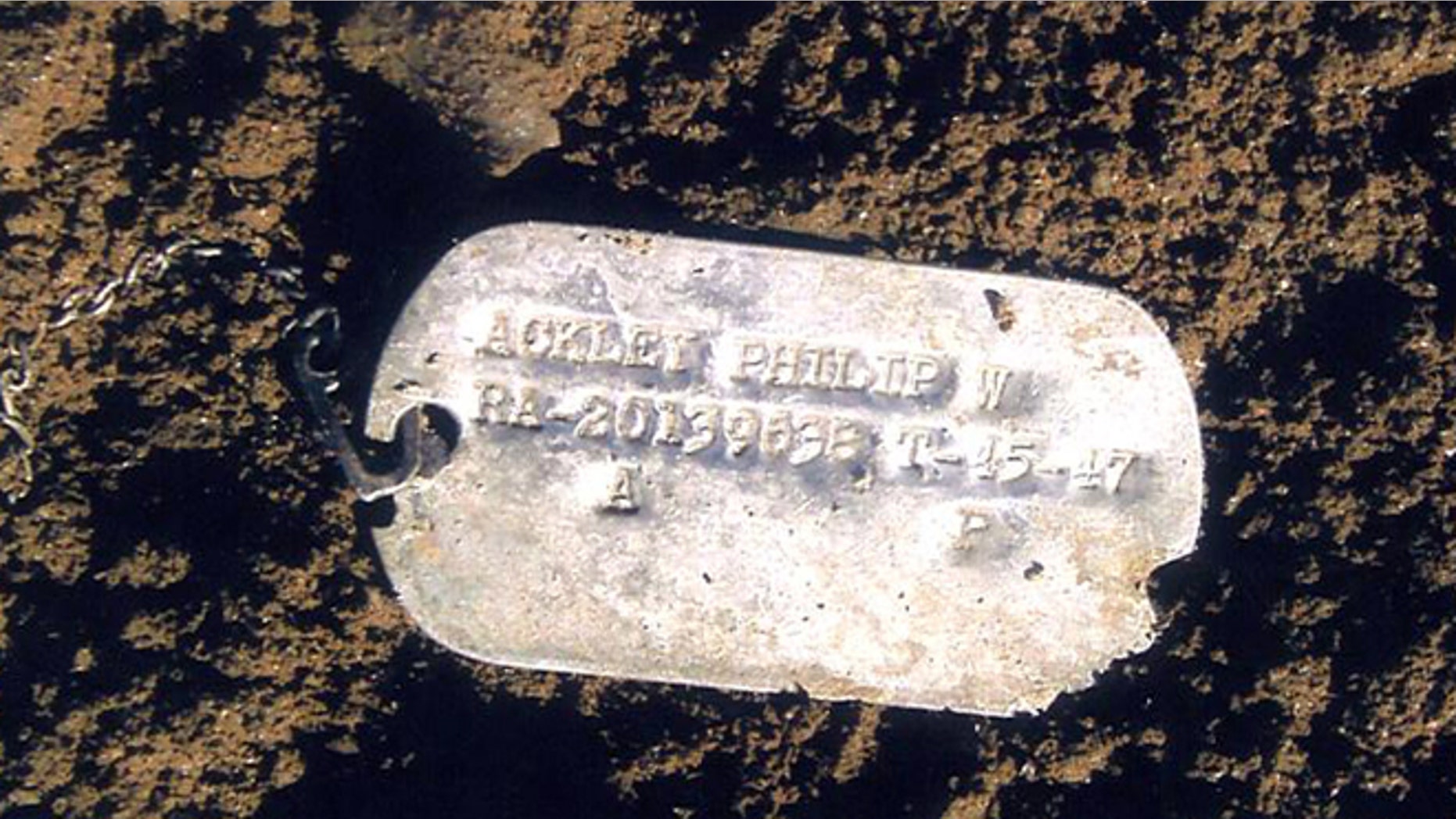 This undated file photo provided on July 14, 2010 by the U.S. Defense Dept. shows Pfc. Philip W. Ackley's Korean War dog tag. (AP/U.S. Defense Dept.)