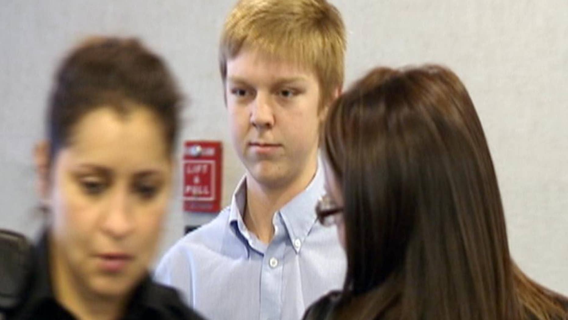 FILE - This Dec. 2013 file image taken from a video by KDFW-FOX 4, Ethan Couch, who killed four people in a drunken wreck in 2013, appears for his court hearing in Fort Worth, Texas. Couch’s family has settled with some, but not all, of the victims suing them. Court records indicate the family has settled three lawsuits brought against them, including suits involving three of the four people who died. But at least four other lawsuits have not been settled. (AP Photo/KDFW-FOX 4, File)