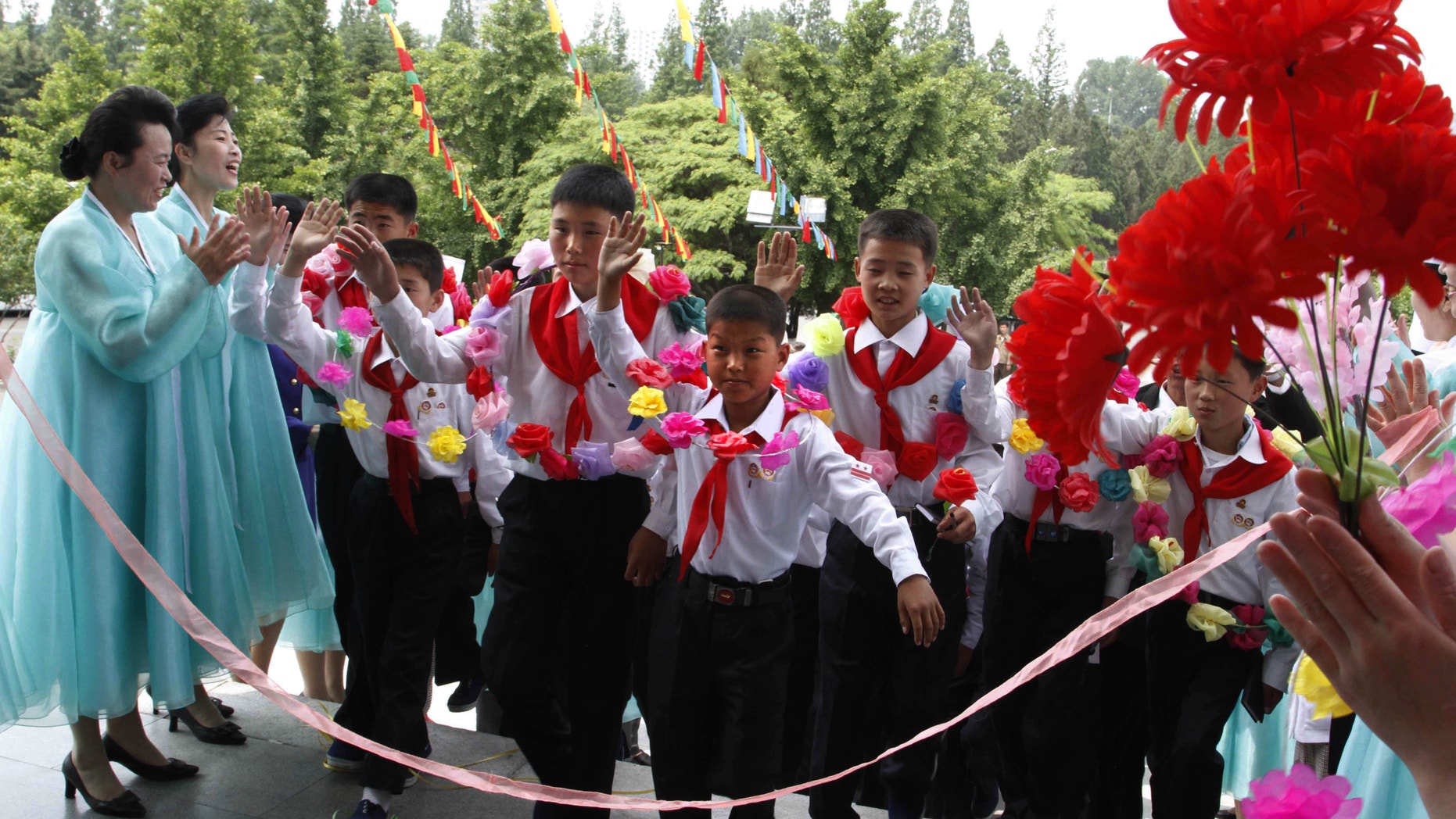 June 3, 2012: North Korean students who were selected as delegates to the Korean Children's Union, arrive for lunch at a restaurant in Pyongyang.