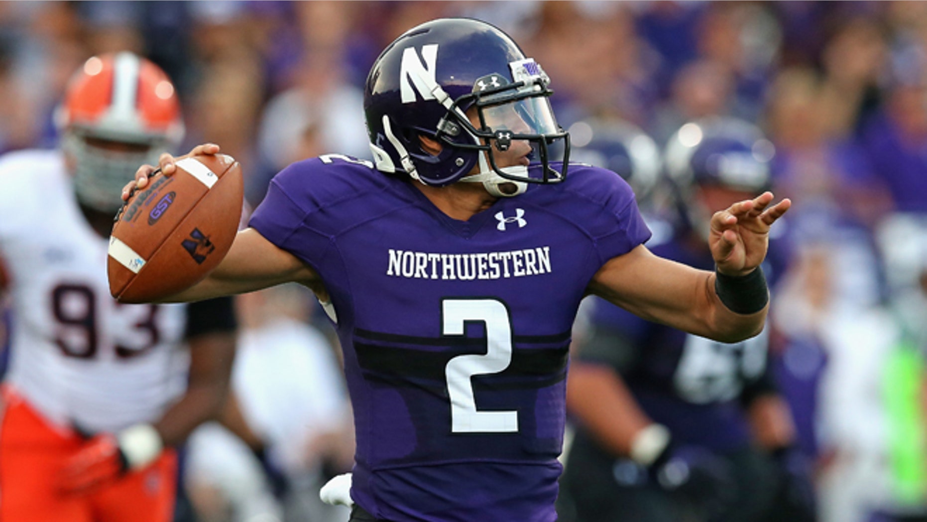 EVANSTON, IL - SEPTEMBER 07: Kain Colter #2 of the Northwestern Wildcats passes against the Syracuse Orange at Ryan Field on September 7, 2013 in Evanston, Illinois. (Photo by Jonathan Daniel/Getty Images)