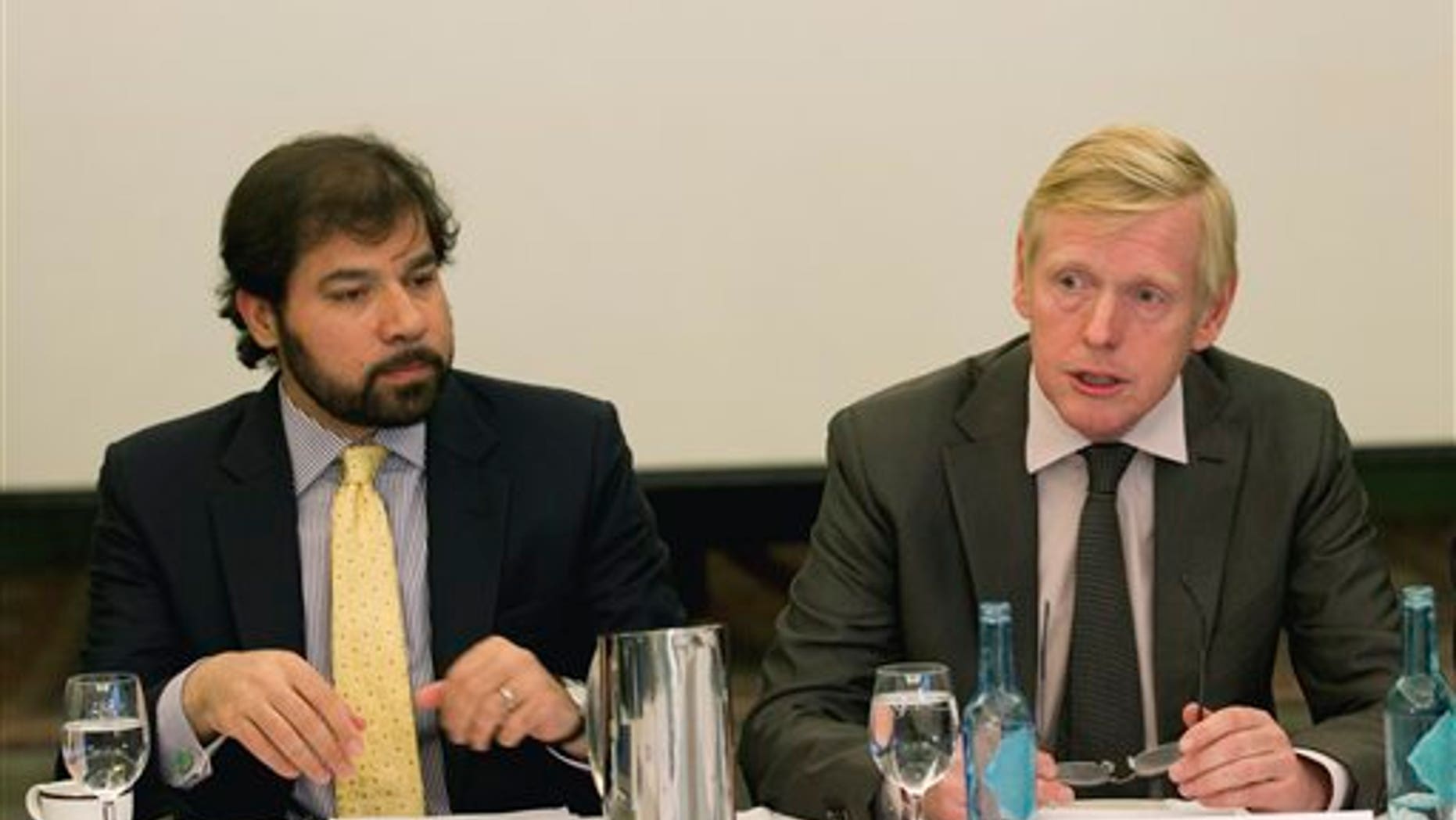 September 30: Afghanistan's Deputy Foreign Minister Jawed Ludin, left, and representative of the Norwegian Ministry of Foreign Affairs Kare Aas during their meeting in Oslo, Norway.