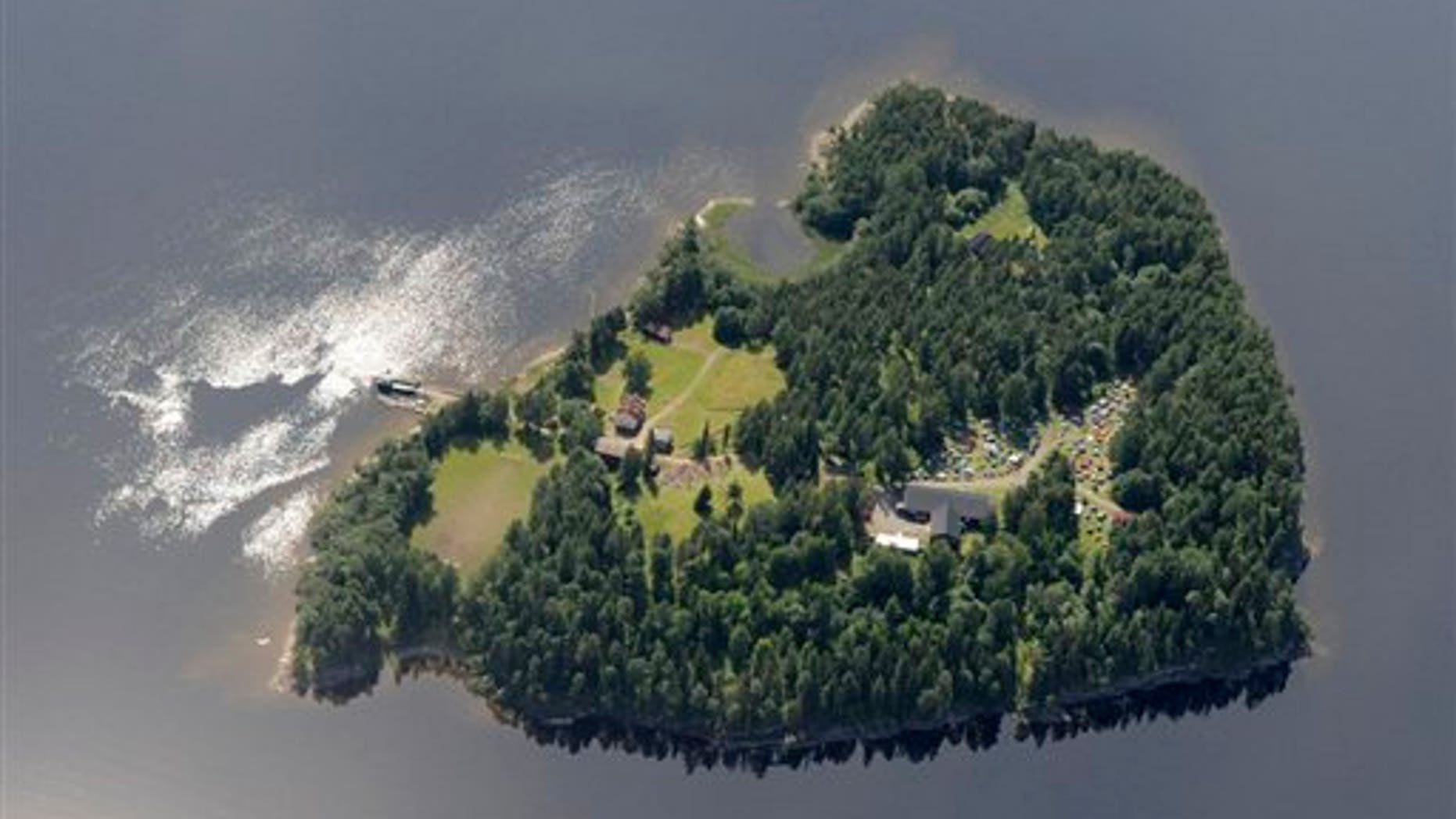 An aerial view of Utoya Island, Norway taken Thursday, July 21, 2011. Police say they are sending anti-terror police to a youth camp outside Oslo after reports of a shooting there following the bomb blast at the government headquarters. The news site VG reported that a man dressed in a police uniform opened fire at the camp. It says several people were injured. Oslo police chief Anstein Gjengdal said anti-terror units were being sent to the camp at Utoya, outside the Norwegian capital. He had no other information on that incident, which came hours after a bomb blast outside the government headquarters killed at least two people and injured 15. (AP Photo/Mapaid, Lasse Tur) NORWAY OUT