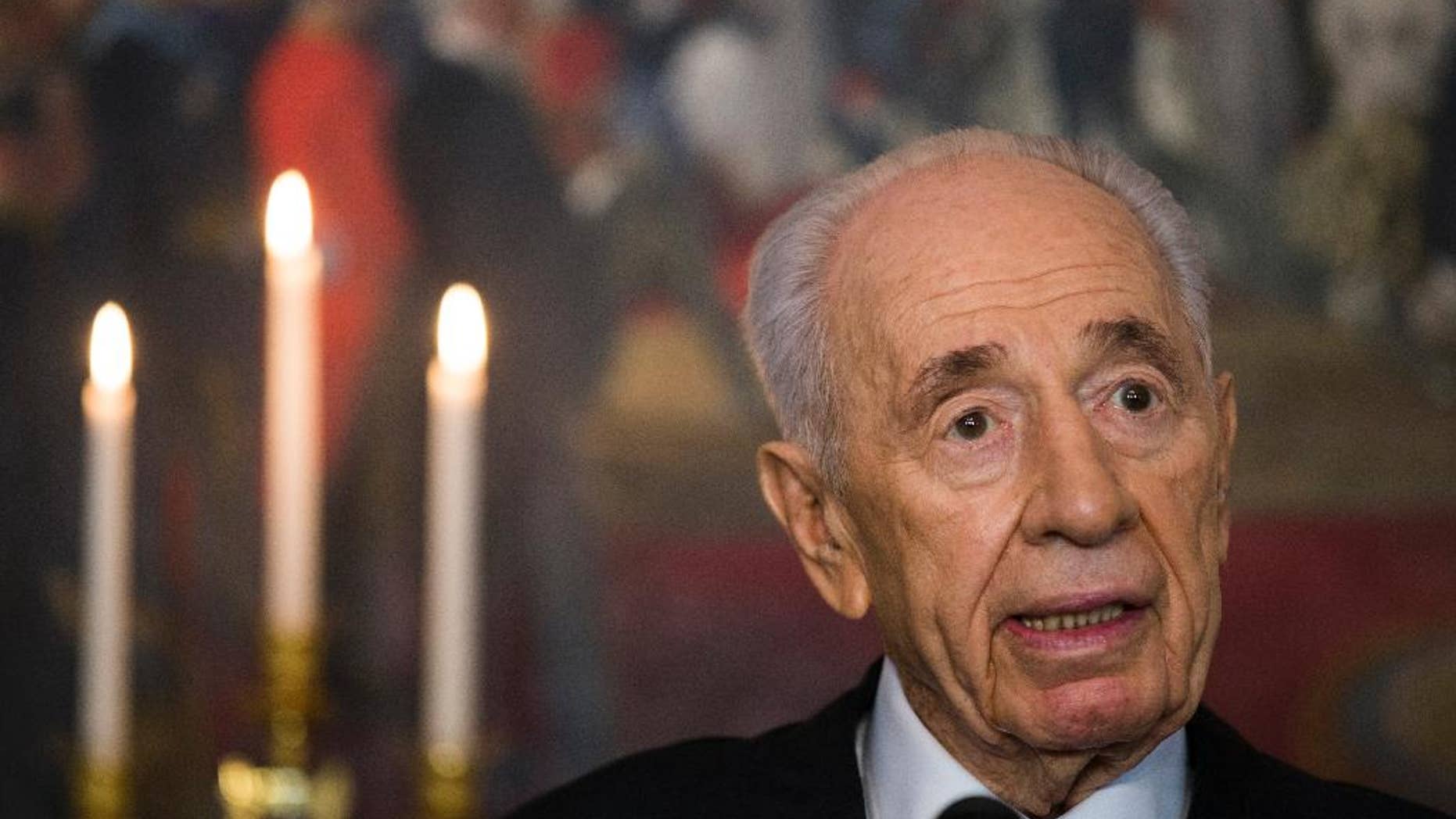 The President of Israel, Shimon Peres answers questions at a press meeting on the first day of his official visit to Norway in Oslo,Monday May 12, 2014. Israeli president and Nobel Peace Prize laureate Shimon Peres arrived in Norway amid political anger and protests over Israel's policies in the occupied territories. . Shimon Peres, 90, who won the Nobel Peace Prize in 1994 for his part in the Oslo Peace Accords, is the first Israeli head of state to visit the country. (AP Photo/Photo/ Berit Roald / NTB scanpix) NORWAY OUT