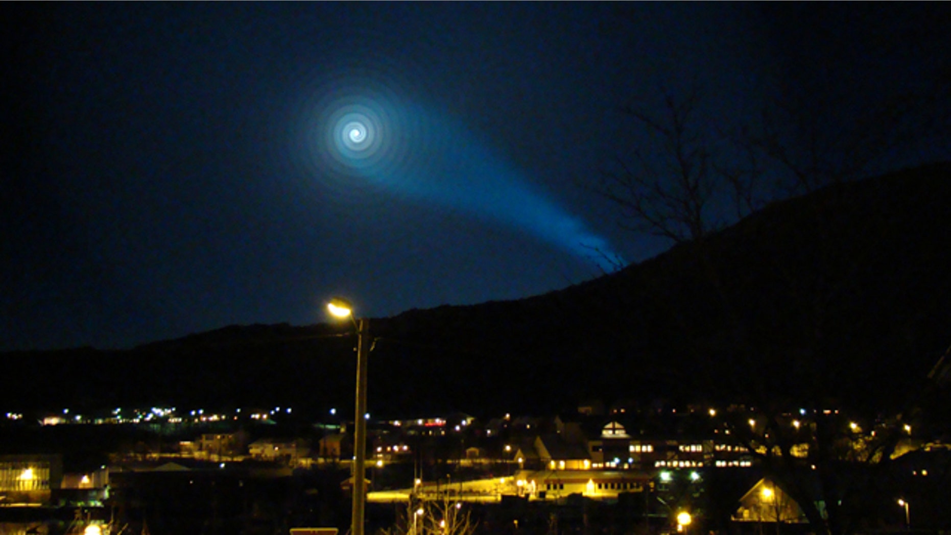 A strange light phenomenon is seen in the night sky above Skjervoy in northern Norway early Wednesday Dec. 9, 2009. According to some reports, the unexplained light may have been caused by the failure of a new Russian anti-submarine-based intercontinental missile which was being tested across the Norwegian-Russian border.