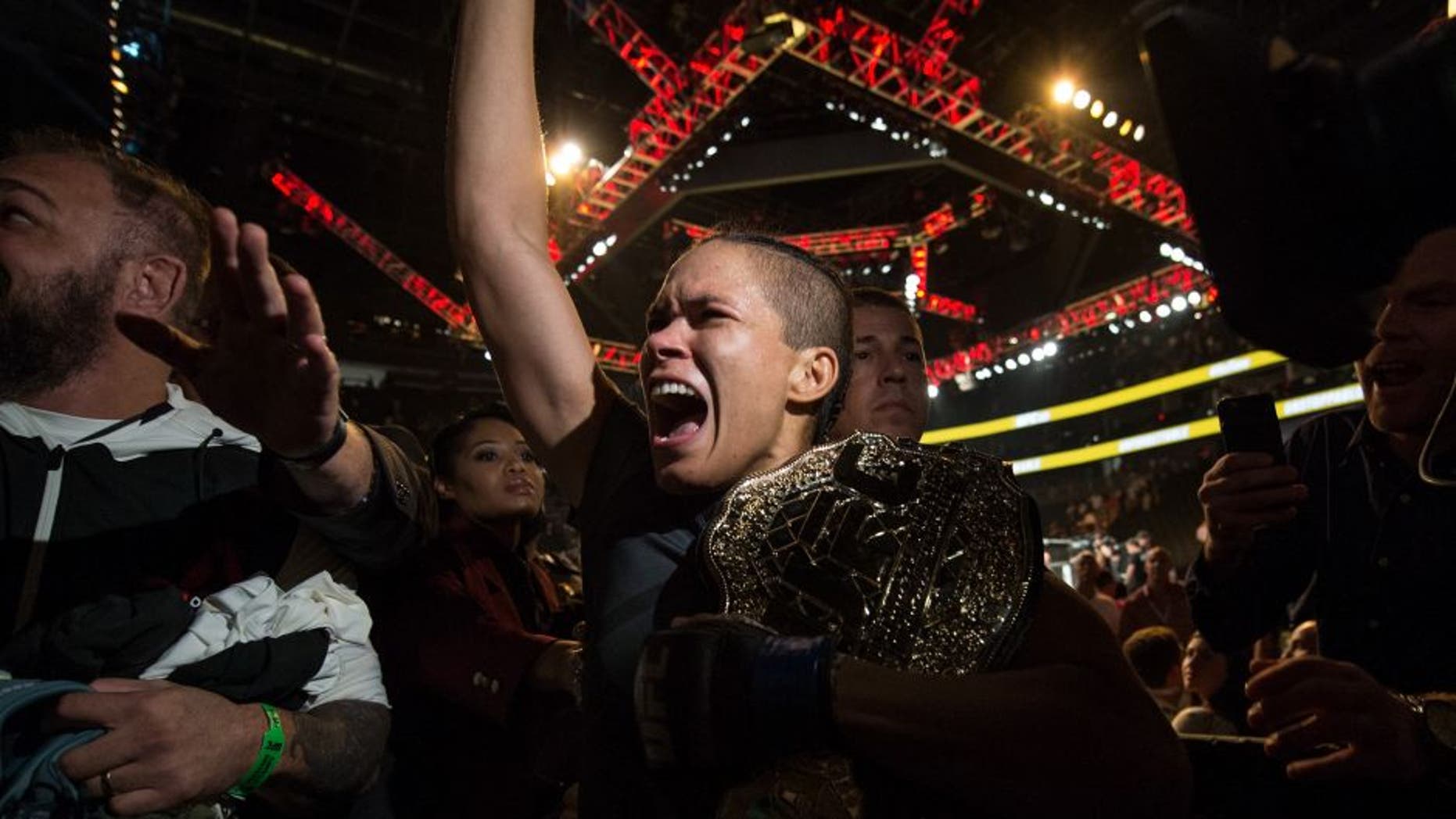 LAS VEGAS, NV - JULY 09: Amanda Nunes of Brazil exits the Octagon after defeating Miesha Tate during the UFC 200 event on July 9, 2016 at T-Mobile Arena in Las Vegas, Nevada. (Photo by Brandon Magnus/Zuffa LLC/Zuffa LLC via Getty Images)