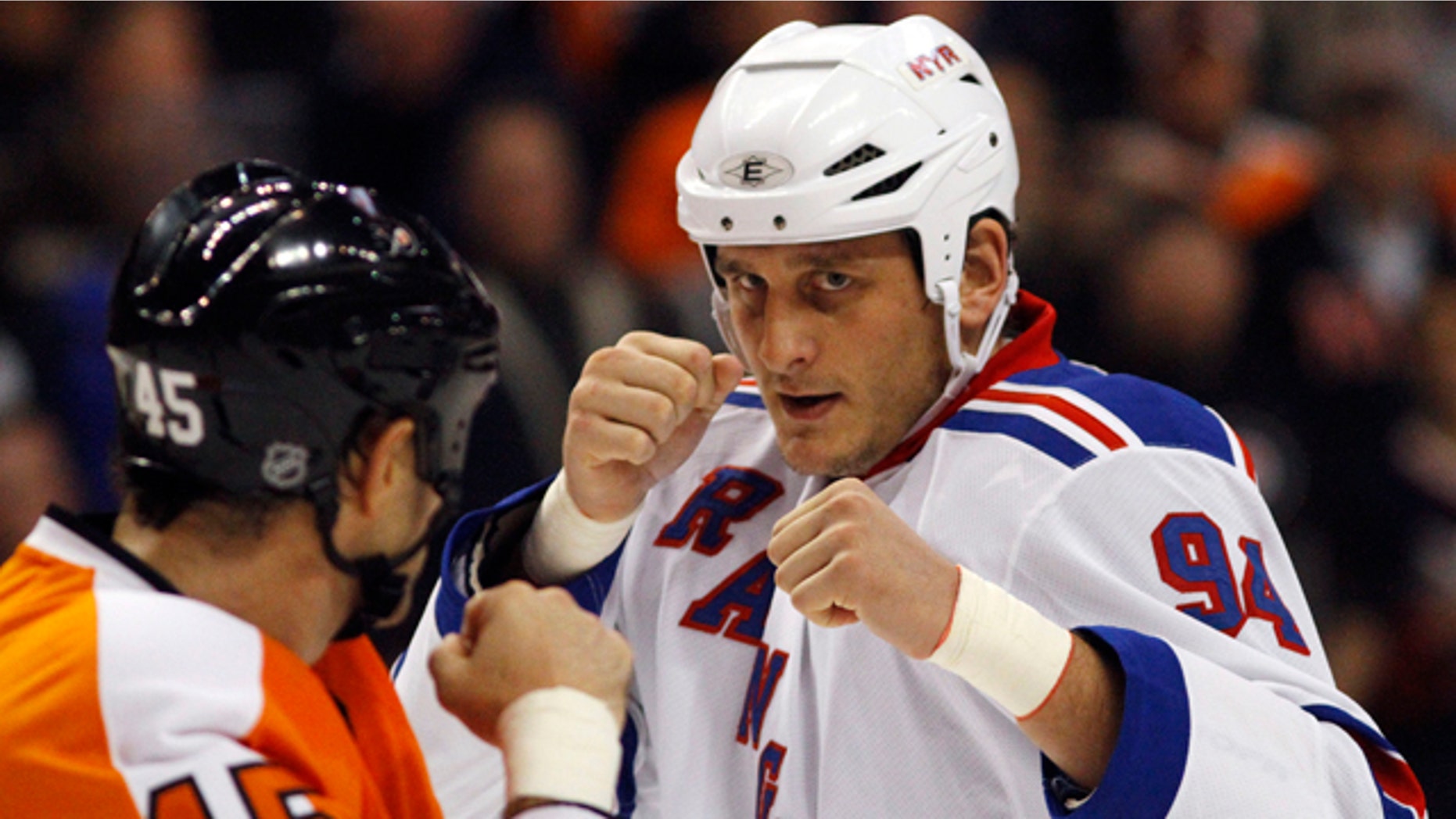 In this Nov. 4, 2010 file photo, Philadelphia Flyers' Jody Shelley, left, and New York Rangers' Derek Boogaard fight during an NHL hockey game in Philadelphia. Boogaard, at age 28, died on Friday. Boogaard signed with the Rangers as a free agent in July 2010 and appeared in 22 games last season, registering one goal and one assist. (AP)