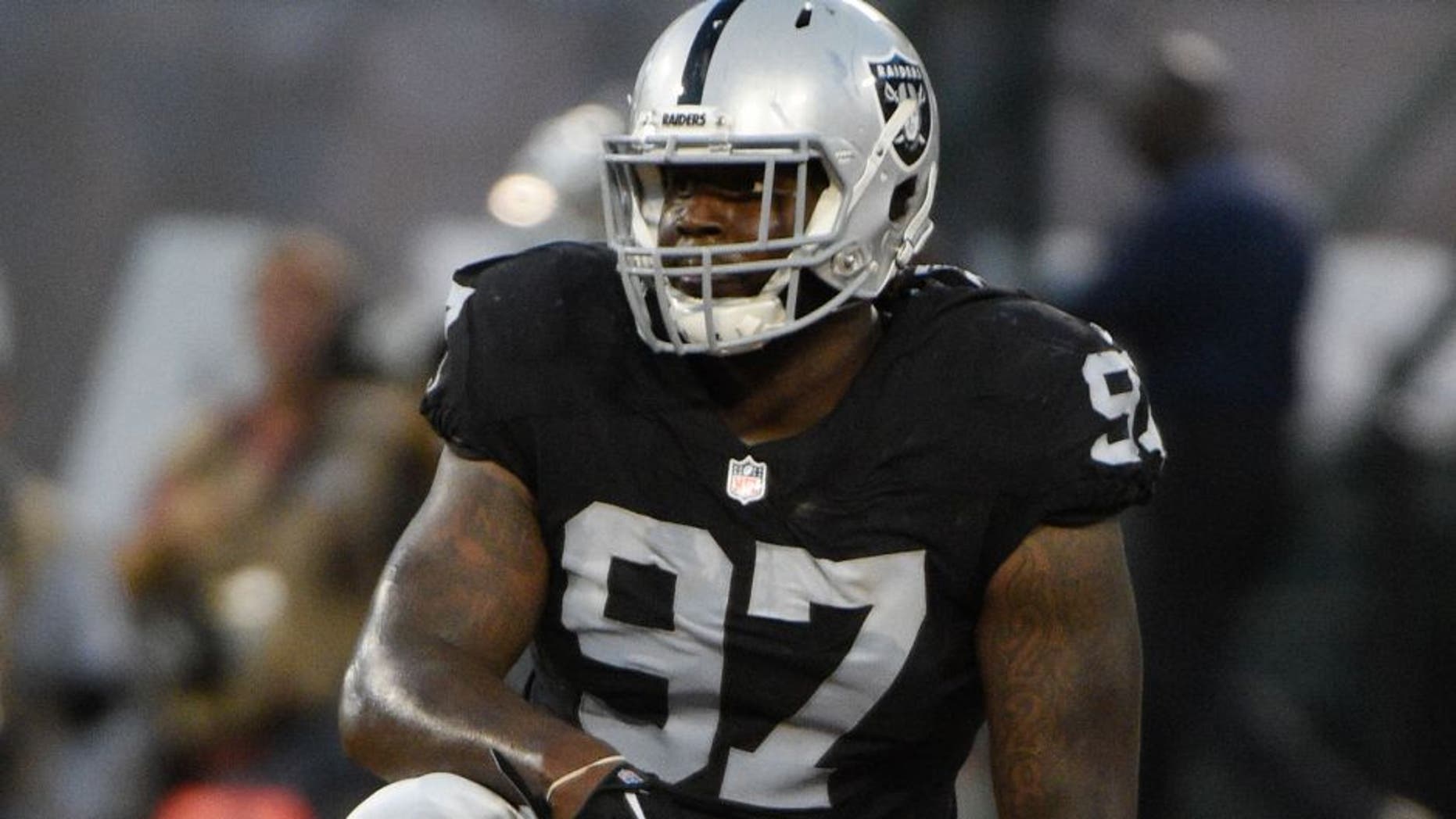 August 14, 2015; Oakland, CA, USA; Oakland Raiders defensive end Mario Edwards Jr. (97) lines up during the second quarter in a preseason NFL football game against the St. Louis Rams at O.co Coliseum. The Raiders defeated the Rams 18-3. Mandatory Credit: Kyle Terada-USA TODAY Sports