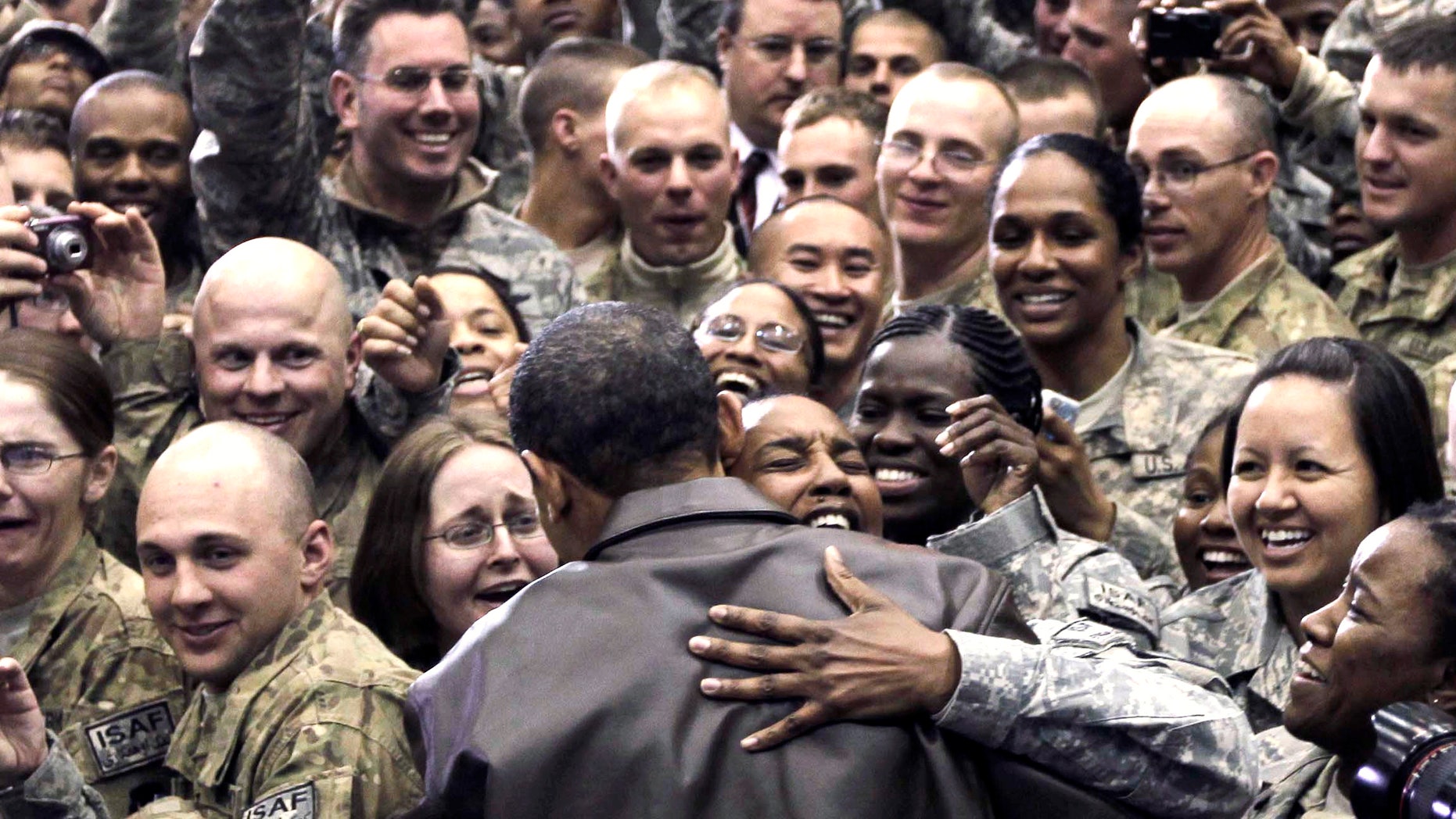 Dec. 3: Obama greets troops at a rally during an unannounced visit at Bagram Air Field in Afghanistan.