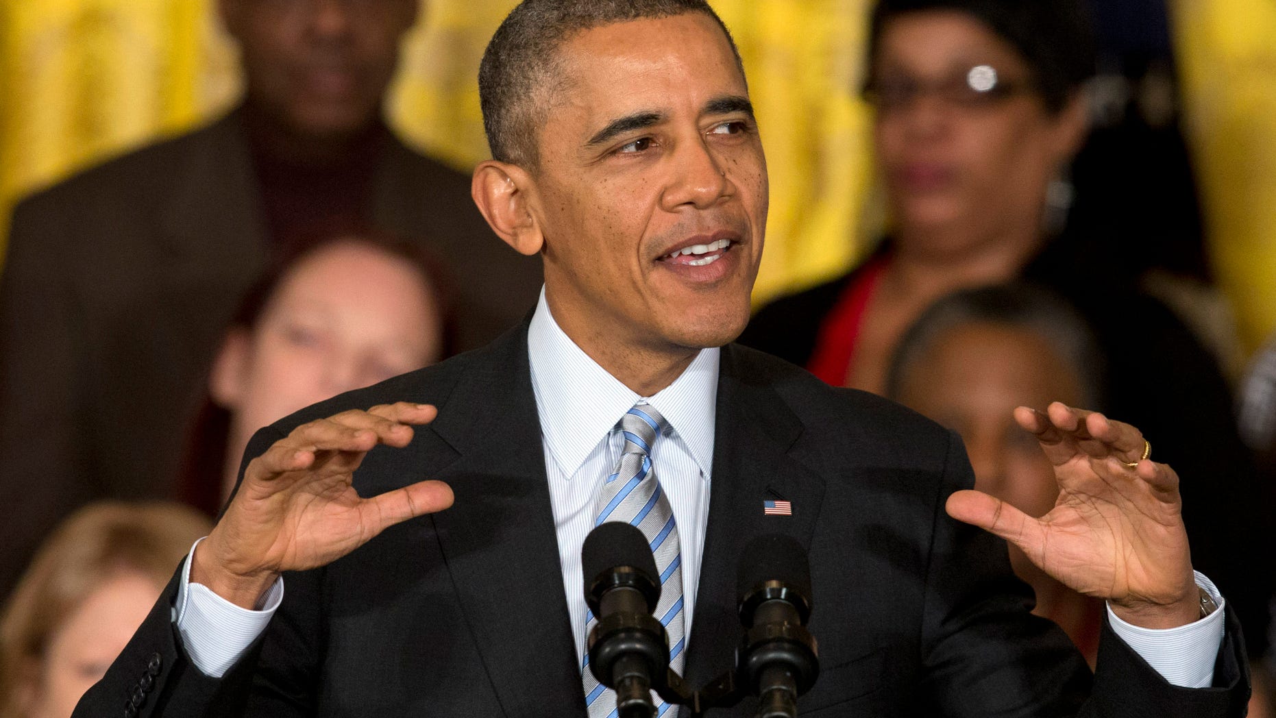 Feb. 12, 2014 President Obama speaks in the East Room of the White House.