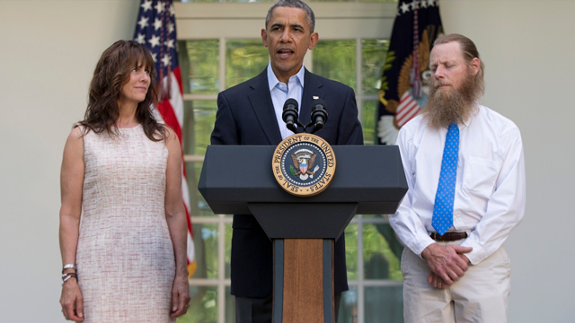 May 31, 2014: President Barack Obama speaks with Jani Bergdahl, left, and Bob Bergdahl, right, the parents of U.S. Army Sgt. Bowe Bergdahl, in the Rose Garden of the White House in Washington after the announcement that Bowe Bergdahl has been released from captivity. (AP Photo/Carolyn Kaster)
