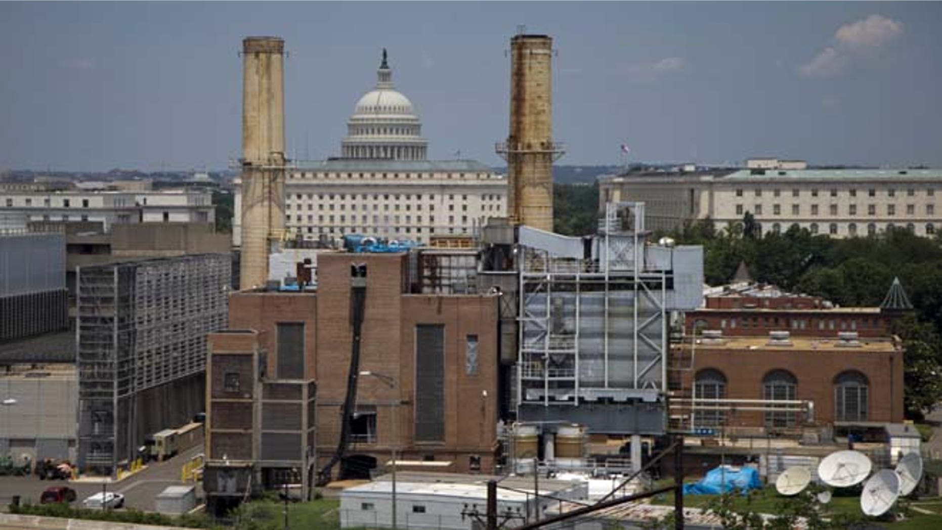 The Capitol Dome is seen behind the Capitol Power Plant in Washington, Monday, June 24, 2013. The plant provides power to buildings in the Capitol Complex.