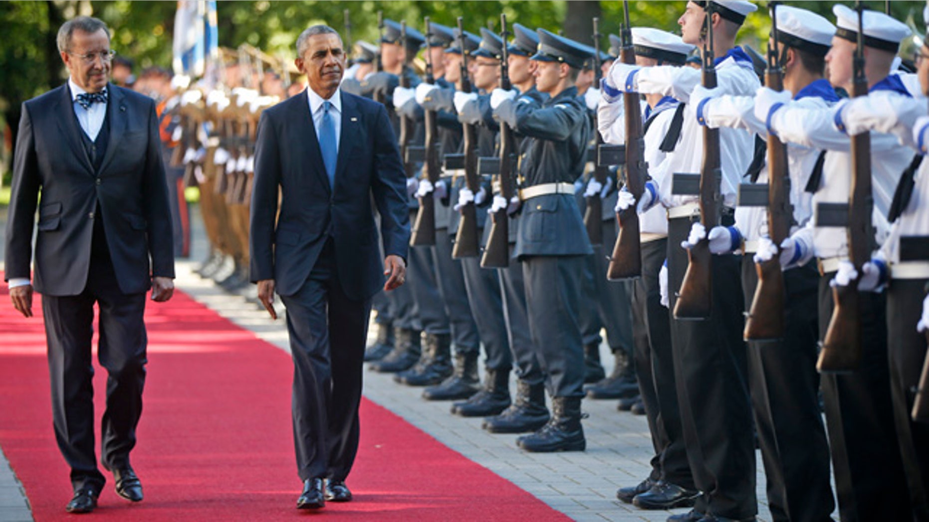 September 3, 2014: U.S. President Barack Obama and Estonian President Toomas Hendrik Ilves review the honor guard at Kadriorg Palace in Tallinn. (AP Photo/Charles Dharapak)