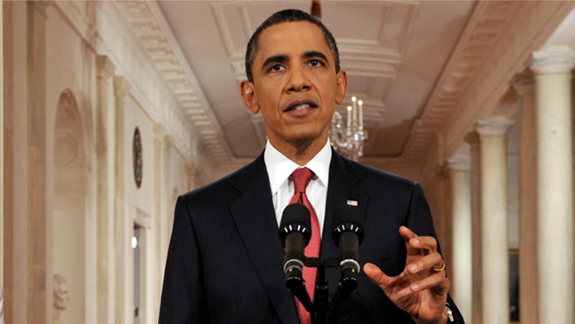 President Obama, shown here July 25, and top auto executives are set to unveil details of a compromise to slash the amount of gasoline cars and trucks will need down the road.