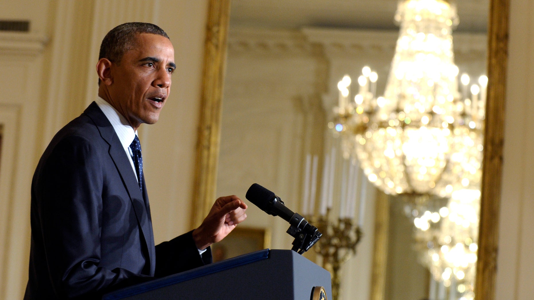 President Barack Obama speaks on the Internal Revenue Service's targeting of conservative groups for extra tax scrutiny in the East Room of the White House in Washington, Wednesday May 15, 2013. Obama announced the resignation of Acting IRS Commissioner Steven Miller, the top official at the IRS. (AP Photo/Susan Walsh)