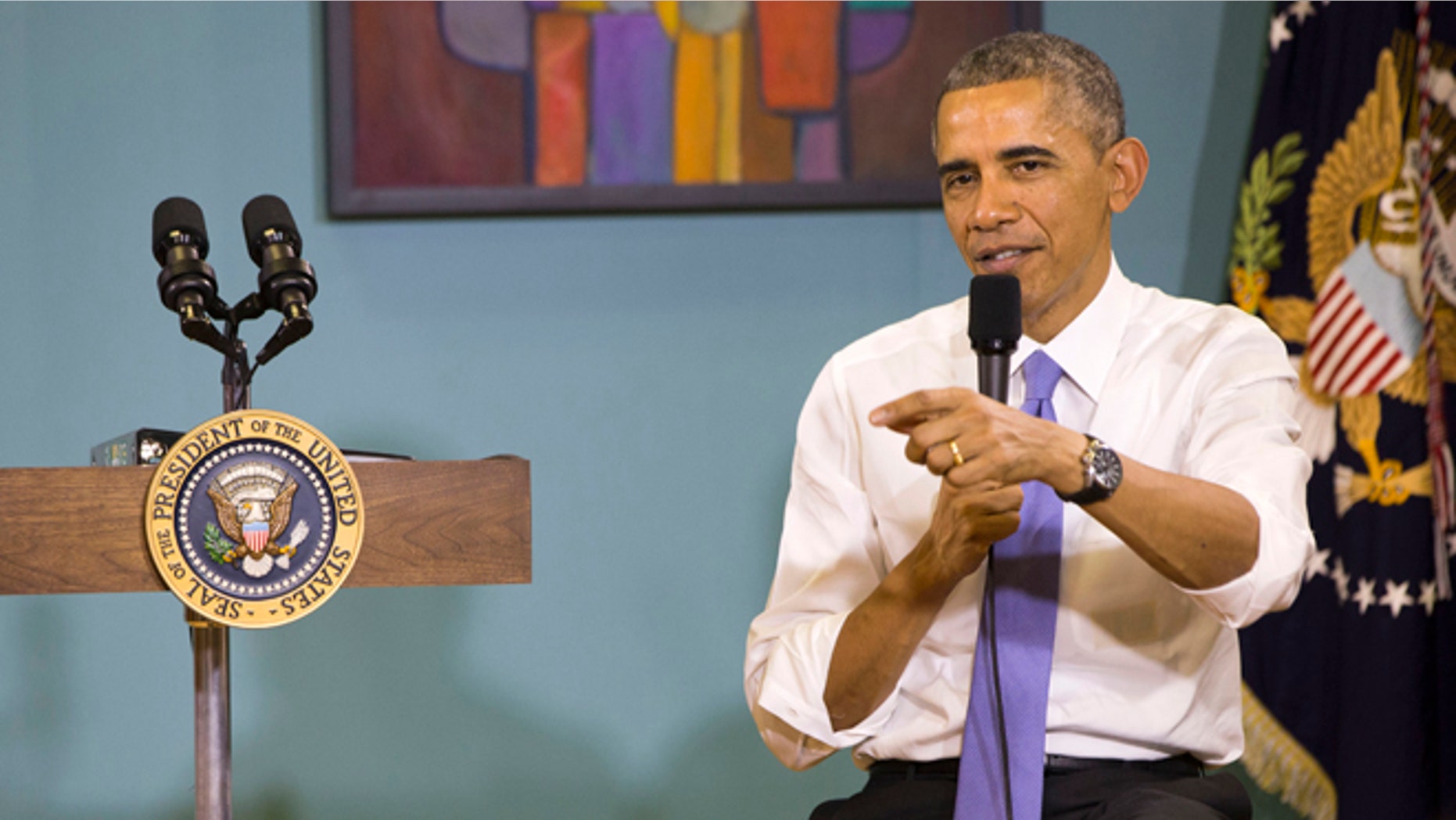 This Tuesday, Dec. 9, 2014 photo shows, President Barack Obama immigration town hall at Casa Azafran in Nashville, Tenn.