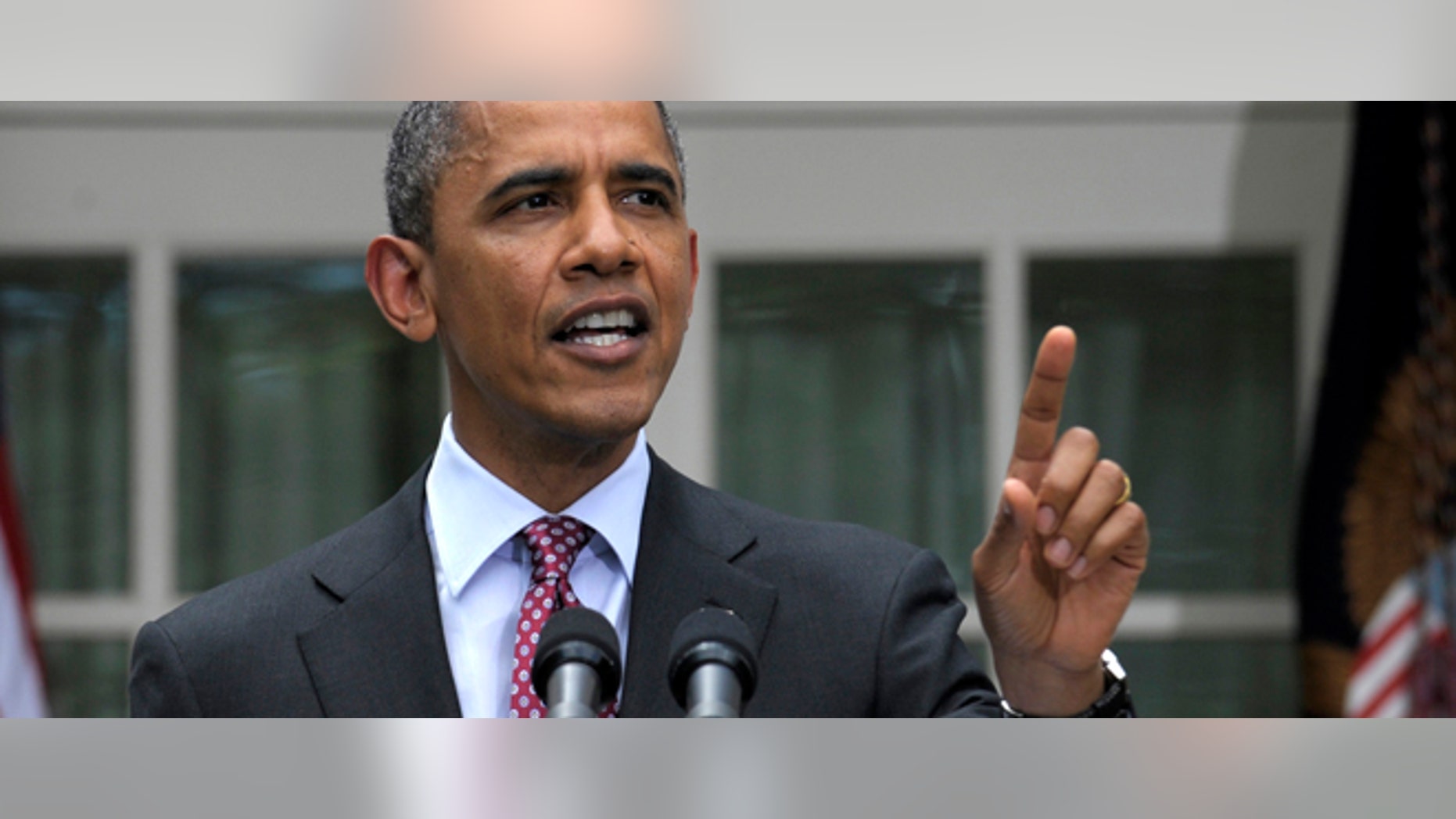 President Barack Obama responds as he is interrupted while announcing that his administration will stop deporting and begin granting work permits to younger illegal immigrants who came to the U.S. as children and have since led law-abiding lives, Friday, June 15, 2012, during a statement in the Rose Garden of the White House in Washington. (AP Photo/Susan Walsh)