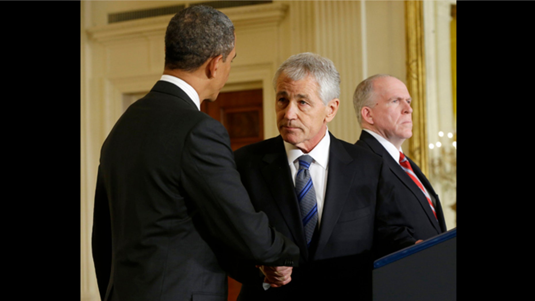 Jan. 7, 2013: President Barack Obama shakes hands with choice for Defense Secretary, former Nebraska Sen. Chuck Hagel, center, after announcing Hagel's nomination in the East Room of the White House in Washington.