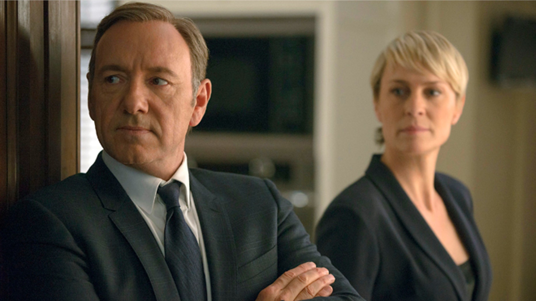 This image released by Netflix shows Kevin Spacey as Francis Underwood, left, and Robin Wright as Clair Underwood in a scene from "House of Cards." The second season of the popular original series premieres on Friday, Feb. 14, 2014 on Netflix. (AP Photo/Netflix, Nathaniel E. Bell)