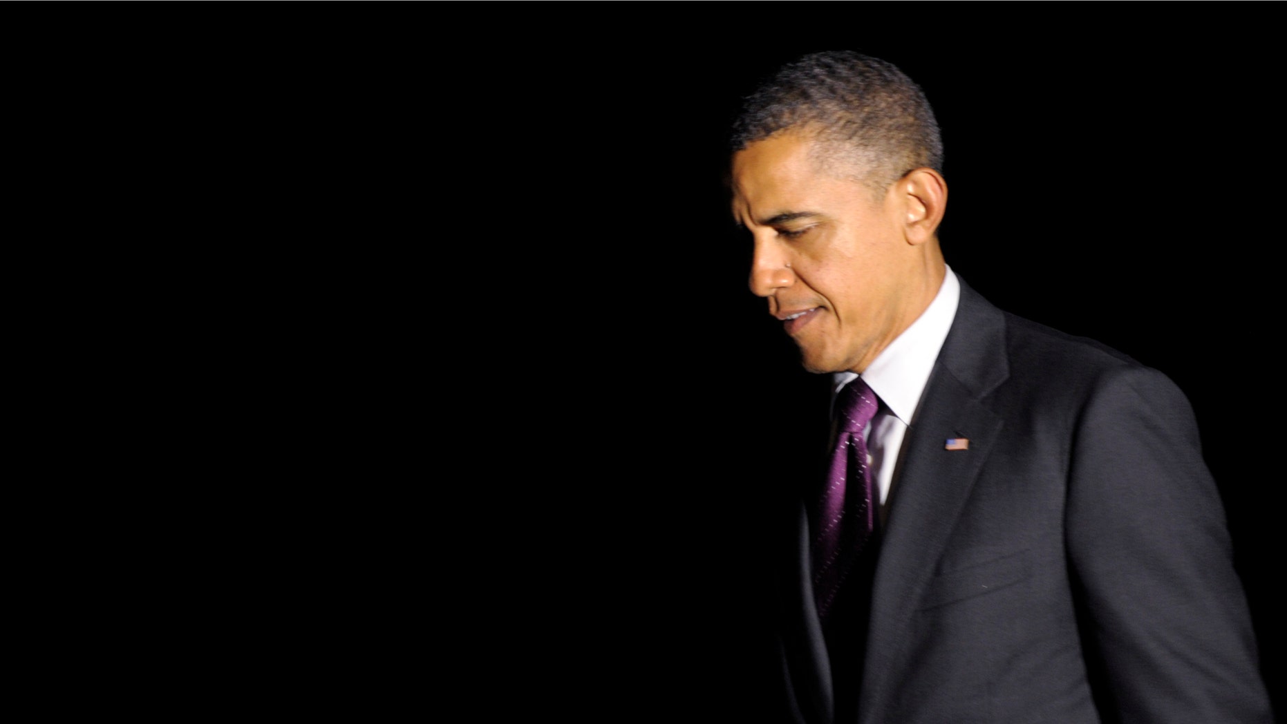 President Barack Obama returns to the the White House in Washington, Friday, June 22, 2012, after campaigning and fundraising in Florida. (AP Photo/Susan Walsh)