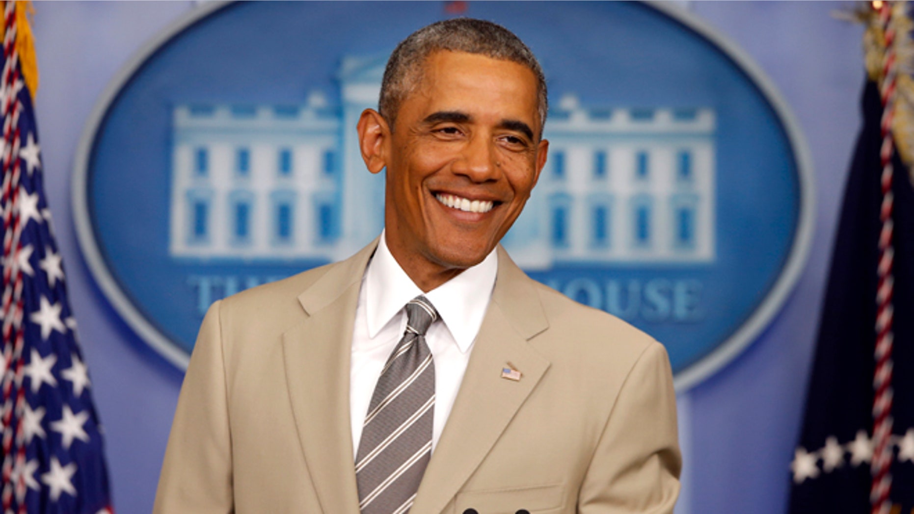 In this Thursday, Aug. 28, 2014 file photo, President Barack Obama in the James Brady Press Briefing Room of the White House in Washington.