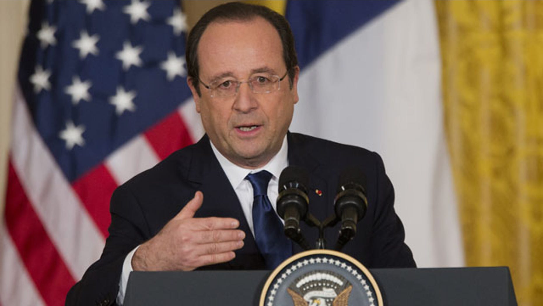 February 11, 2014: French President François Hollande speaks during a joint news conference with President Barack Obama, as part of an official state visit in the East Room of the White House in Washington. (AP Photo/ J. Scott Applewhite)