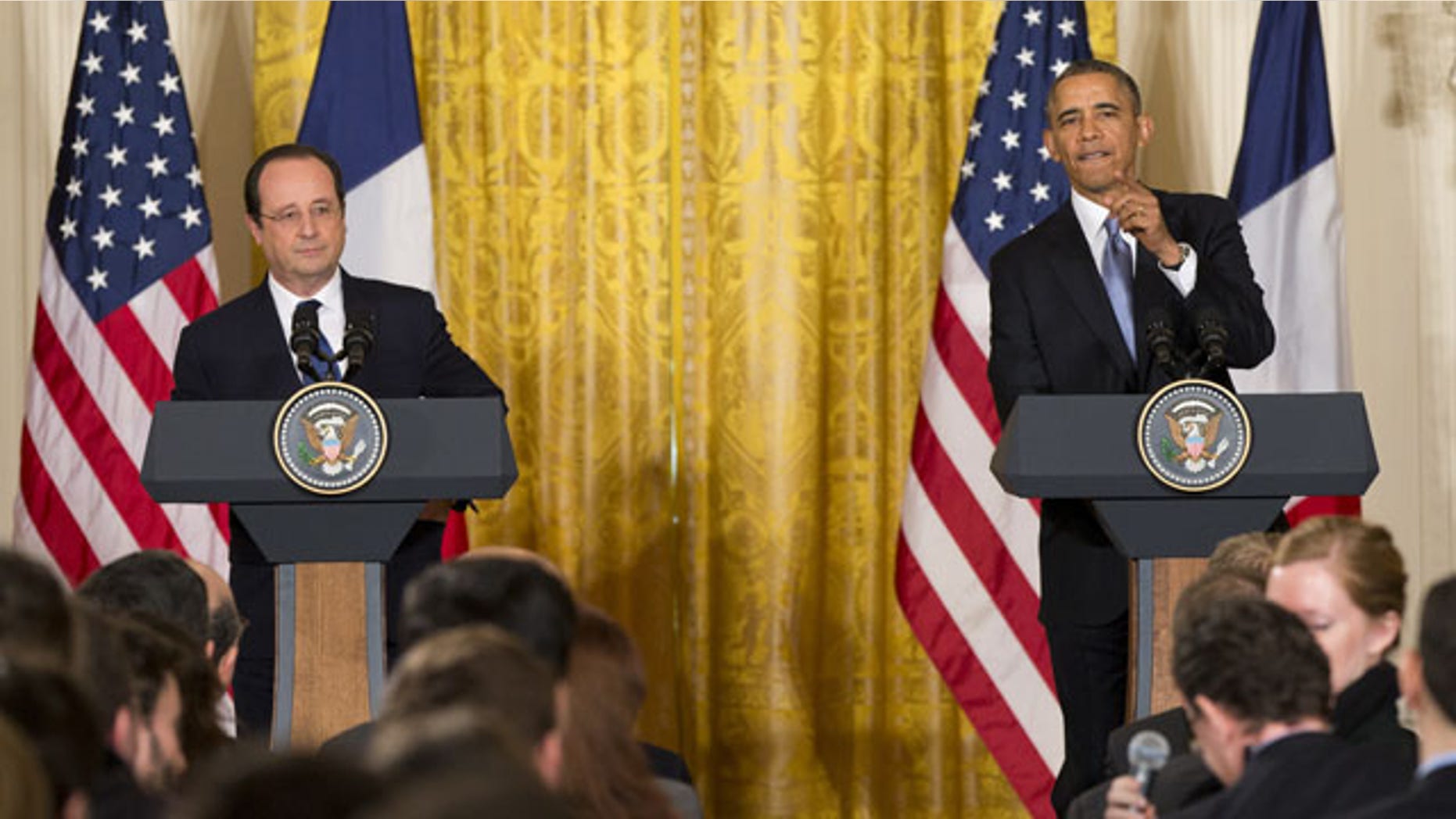 February 11, 2014: President Barack Obama calls on a reporter during a joint news conference with French President François Hollande, as part of an official state visit in the East Room of the White House in Washington. (AP)