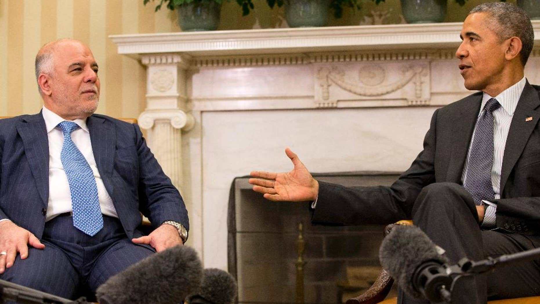 President Barack Obama speaks during his meeting with Iraqi Prime Minister Haider Al-Abadi in the Oval Office of the White House in Washington, Tuesday, April 14, 2015. The Prime Minister is visiting to discuss U.S.-Iraq policy and the fight against the IS group. (AP Photo/Jacquelyn Martin)