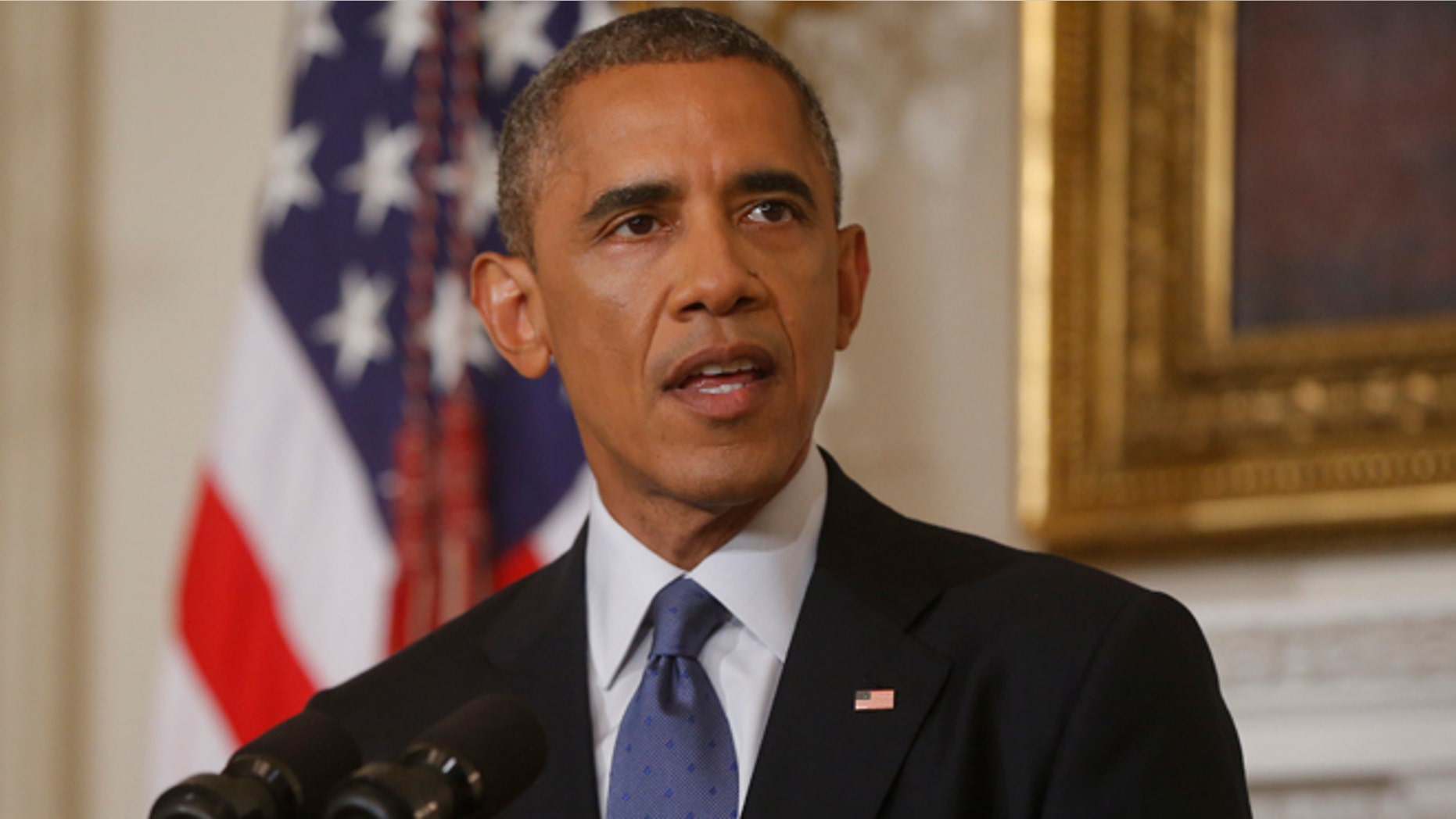 This Aug. 7, 2014, file photo shows President Barack Obama talking about the situation in Iraq in the State Dining Room at the White House in Washington.