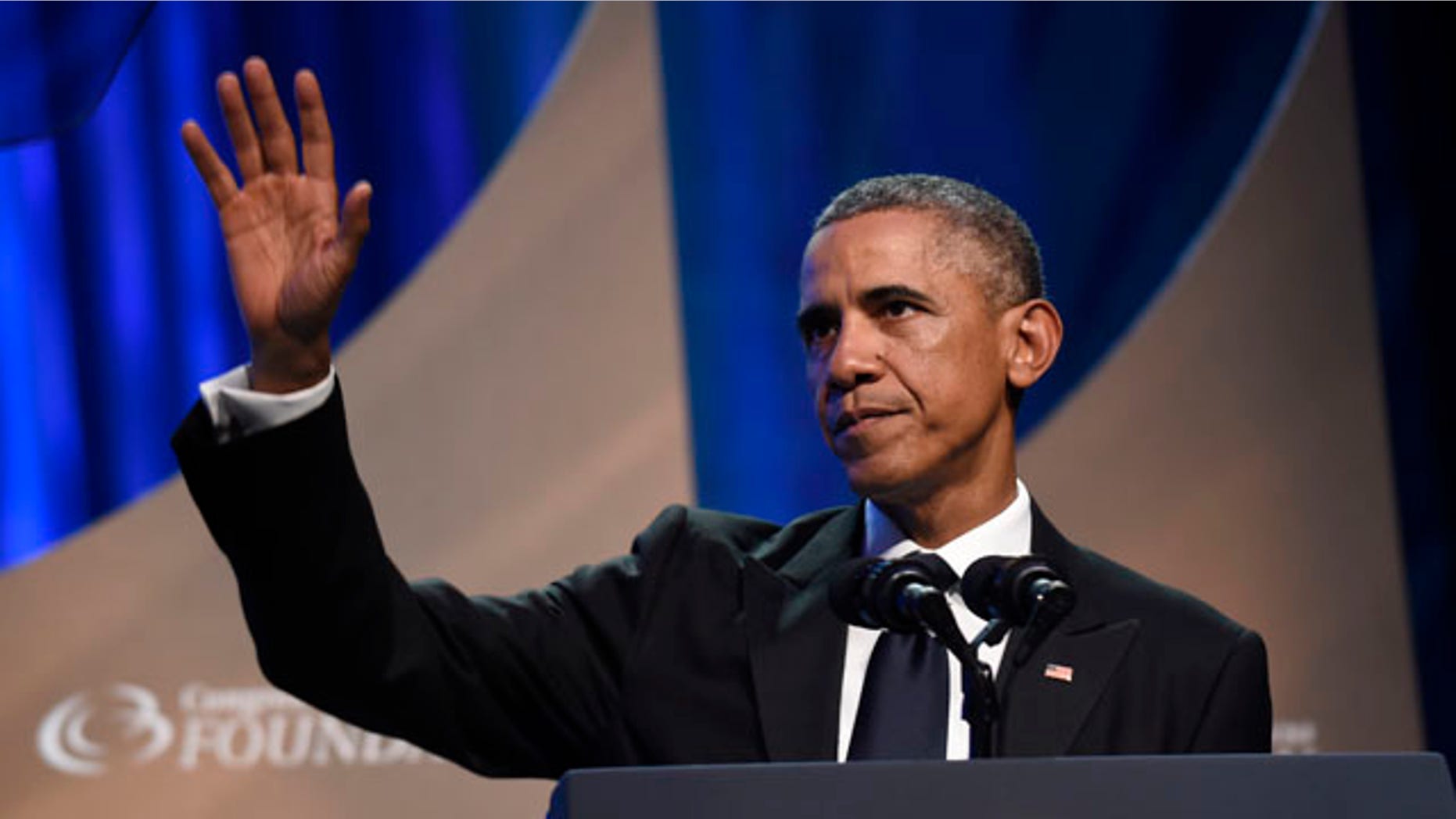 September 27, 2014: President Barack Obama waves to the crowd after speaking at the Congressional Black Caucus Foundations 44th Annual Legislative Conference Phoenix Awards Dinner in Washington. (AP Photo/Susan Walsh)