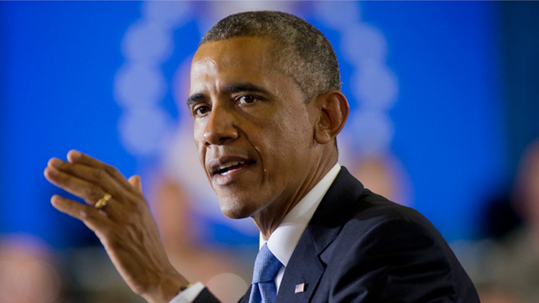In this Wednesday, Sept. 17, 2014 photo, President Barack Obama speaks at US Central Command (CentCom) at MacDill Air Force Base, Fla.