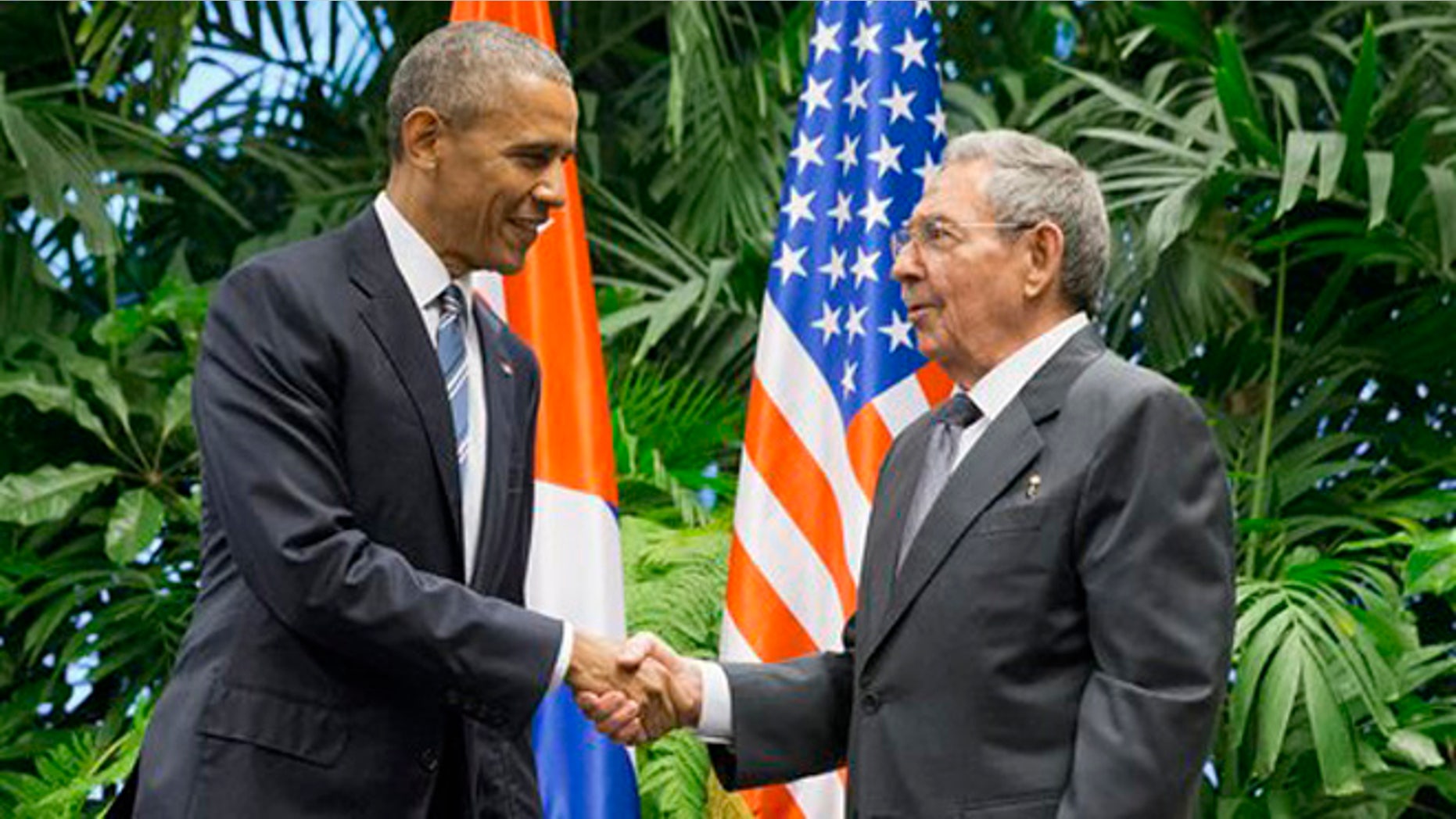 FILE - In this March 21, 2016 file photo, President Barack Obama shakes hands with Cuban President Raul Castro during their meeting at the Palace of the Revolution in Havana, Cuba. (AP Photo/Pablo Martinez Monsivais, File)