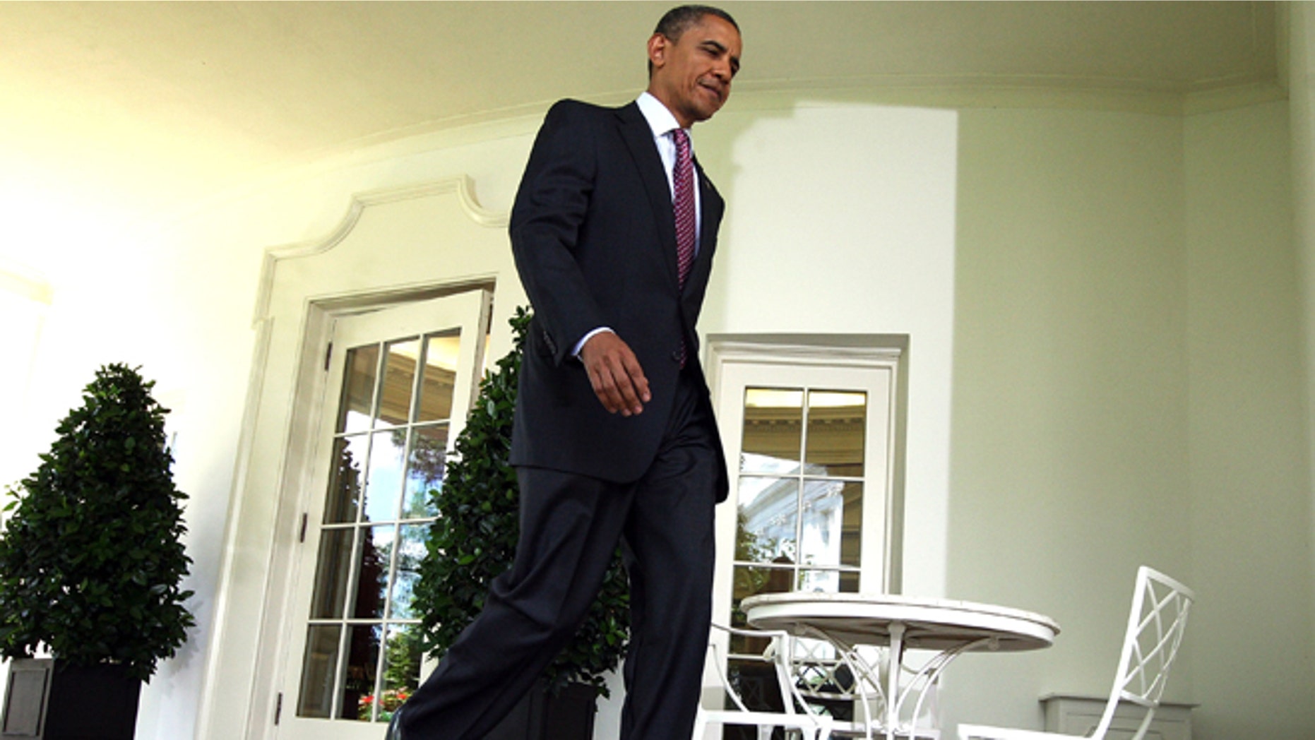 WASHINGTON, DC - JUNE 15: U.S. President Barack Obama walks out from the Oval Office for remarks at the Rose Garden of the White House June 15, 2012 in Washington, DC. Obama said the administration will stop deporting undocumented immigrants who had come to the U.S. when they were at a young age. (Photo by Alex Wong/Getty Images)