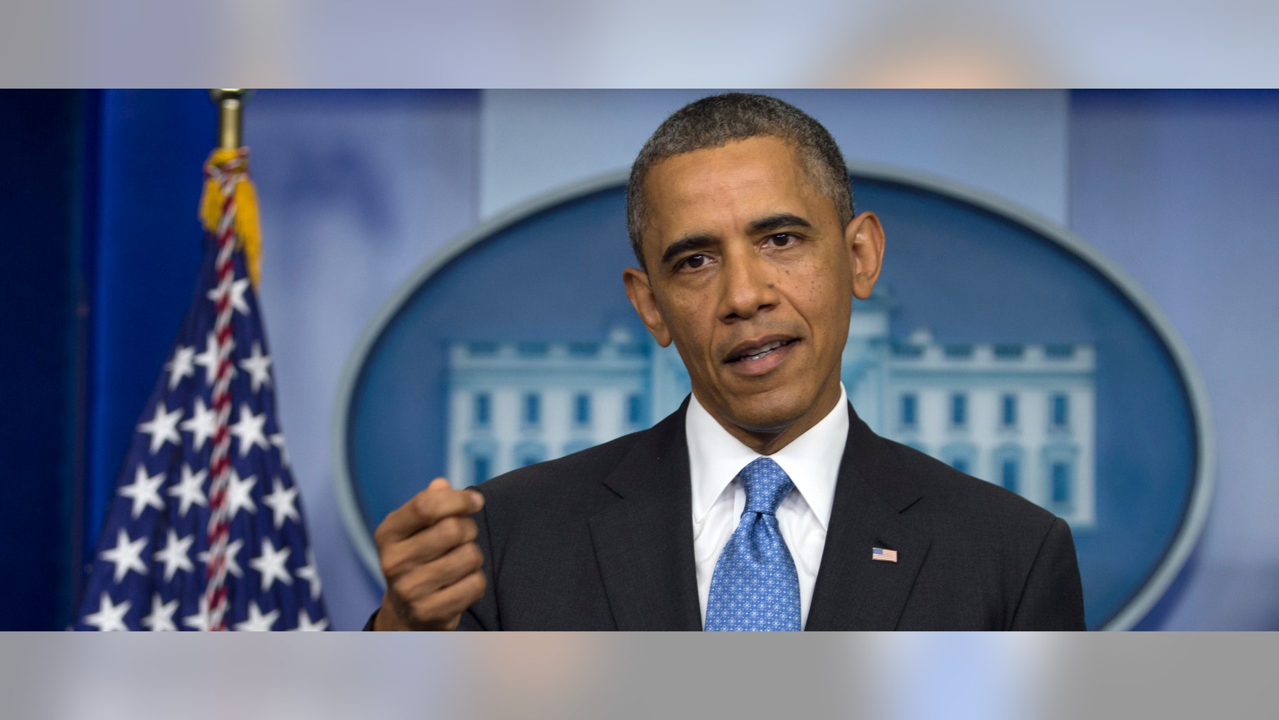 President Barack Obama gestures as he speaks during his daily news briefing at the White House, Friday, July 19, 2013, in Washington, about the fatal shooting of Trayvon Martin by George Zimmerman. (AP Photo/Carolyn Kaster)