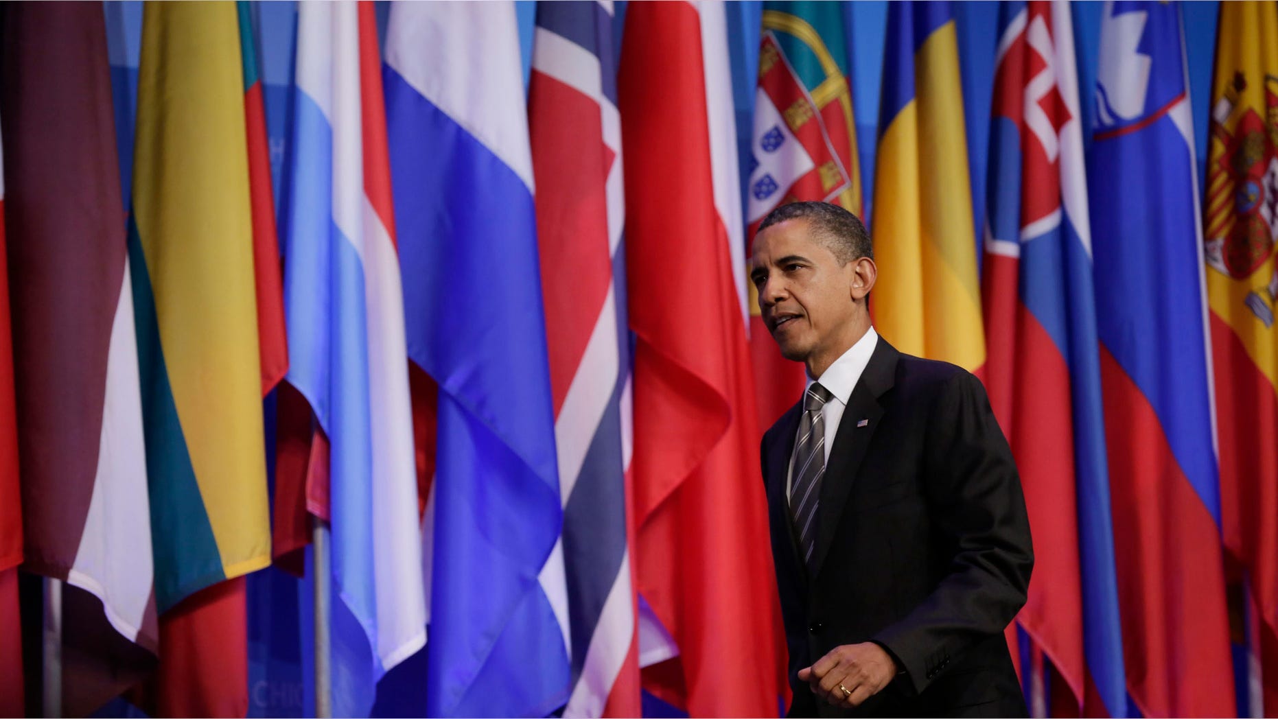 CHICAGO, IL - MAY 21: U.S. President Barack Obama arrives for a press conference at the closing of the NATO summit on May 21, 2012 at McCormick Place in Chicago, Illinois. As sixty heads of state converge for the two day summit that will address the situation in Afghanistan among other global defense issues, thousands of demonstrators have taken the streets to protest. (Photo by John Gress/Getty Images)