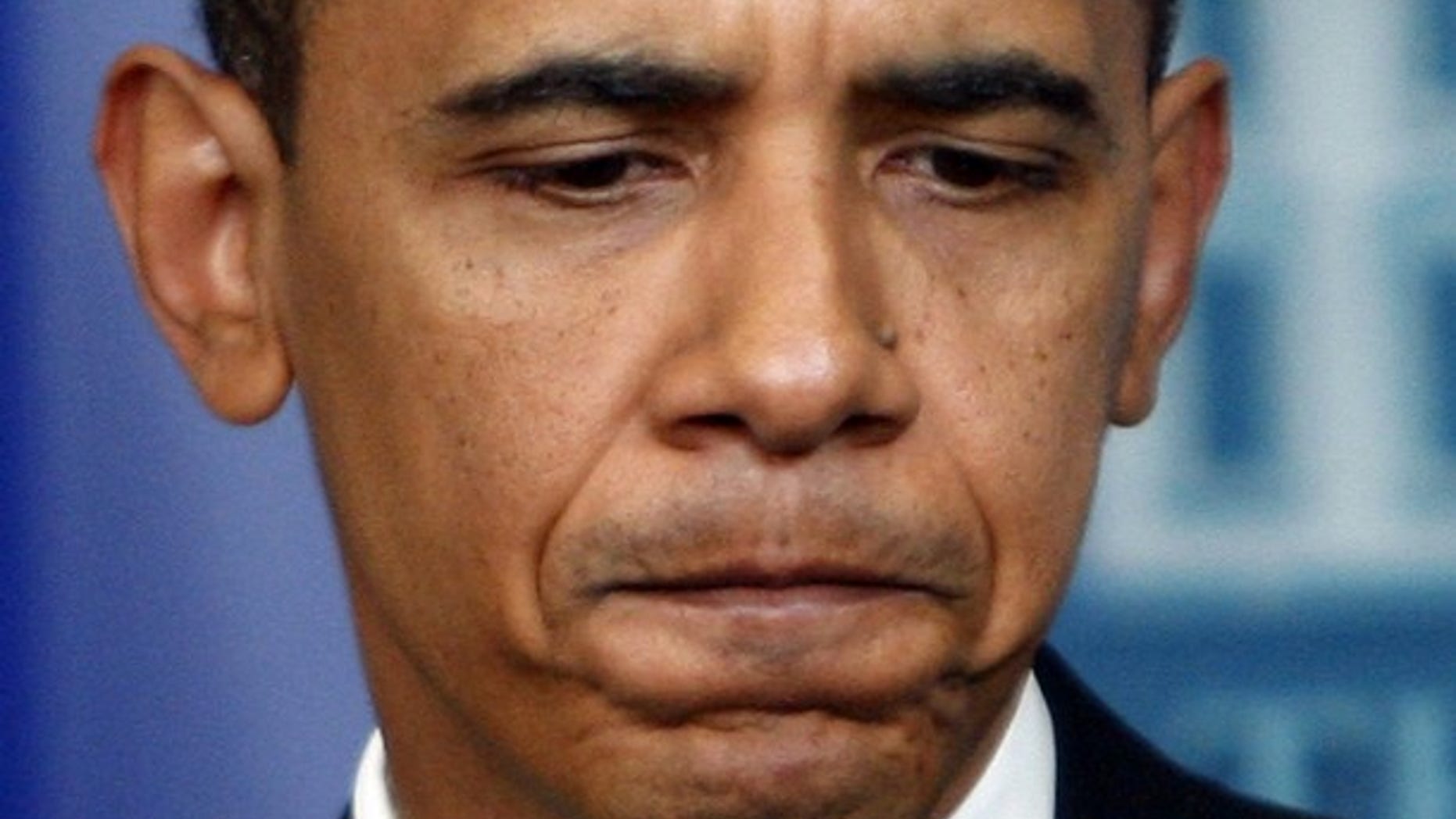 U.S. President Barack Obama makes remarks at the daily briefing after a surprise visit to the Brady Briefing Room at the White House in Washington, July 24, 2009. Obama said he should have chosen his words more carefully when he said police "acted stupidly" in arresting a prominent black Harvard professor Henry Louis Gates, touching off a debate over race. REUTERS/Jim Young (UNITED STATES POLITICS CRIME LAW)